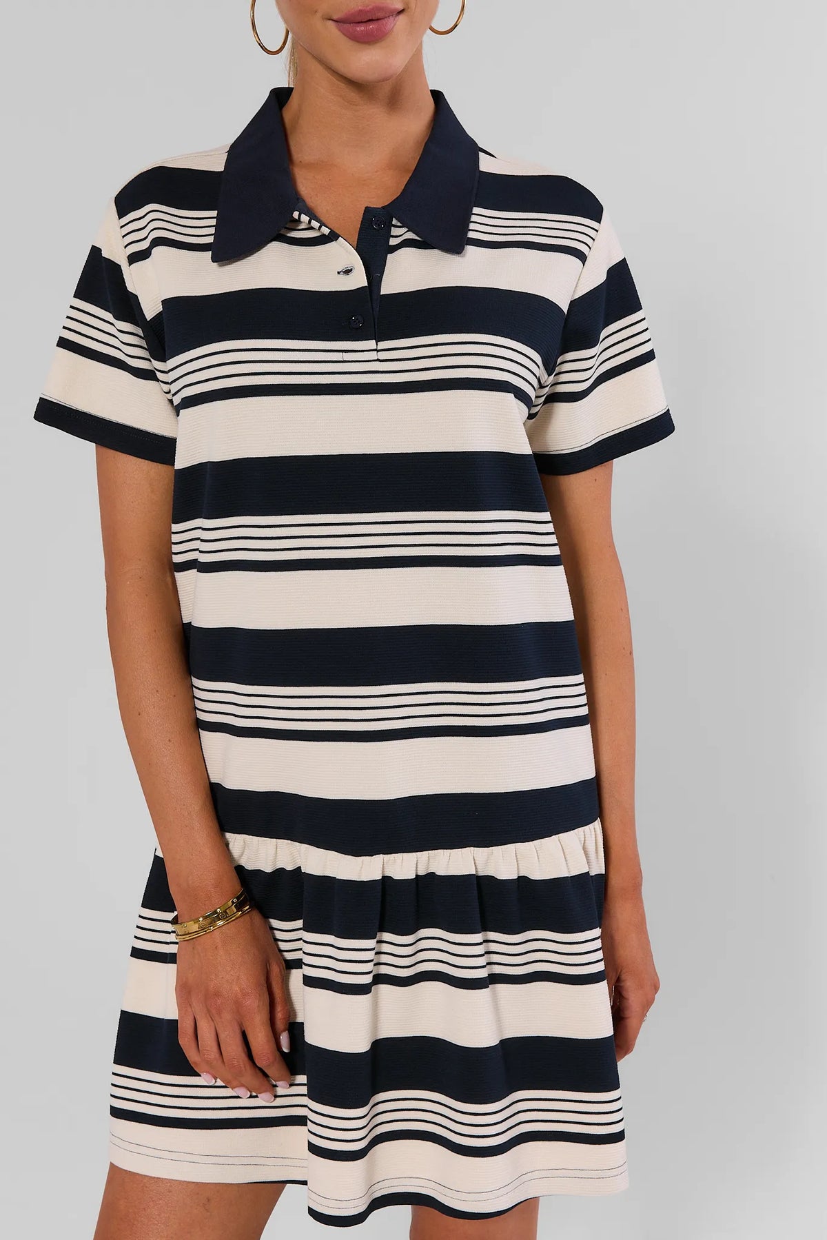 Navy Stripe Collared Short Dress full-length front view showing drop-waist ruffle hem, women's striped dress | Avara