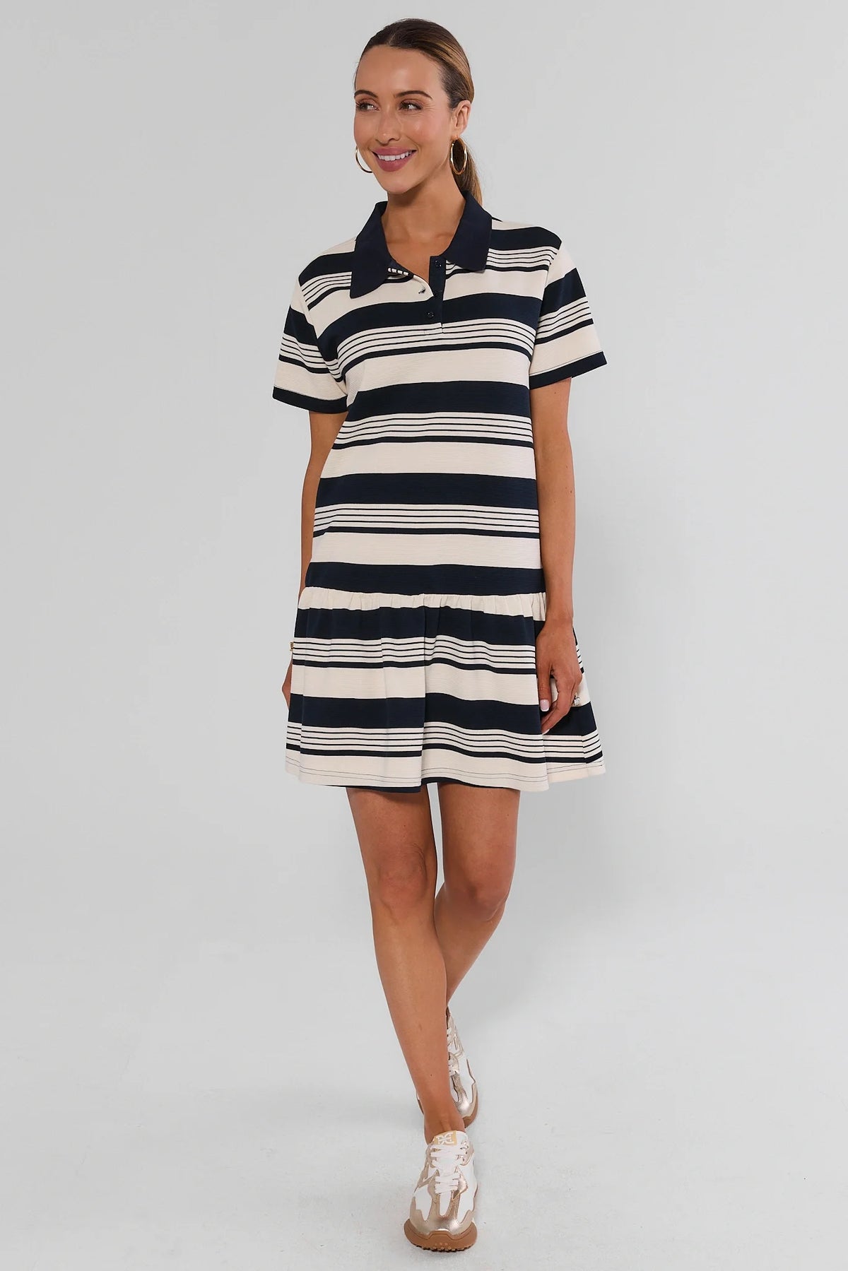 Navy Stripe Collared Short Dress three-quarter view styled with metallic sneakers, women's cute dress | Avara