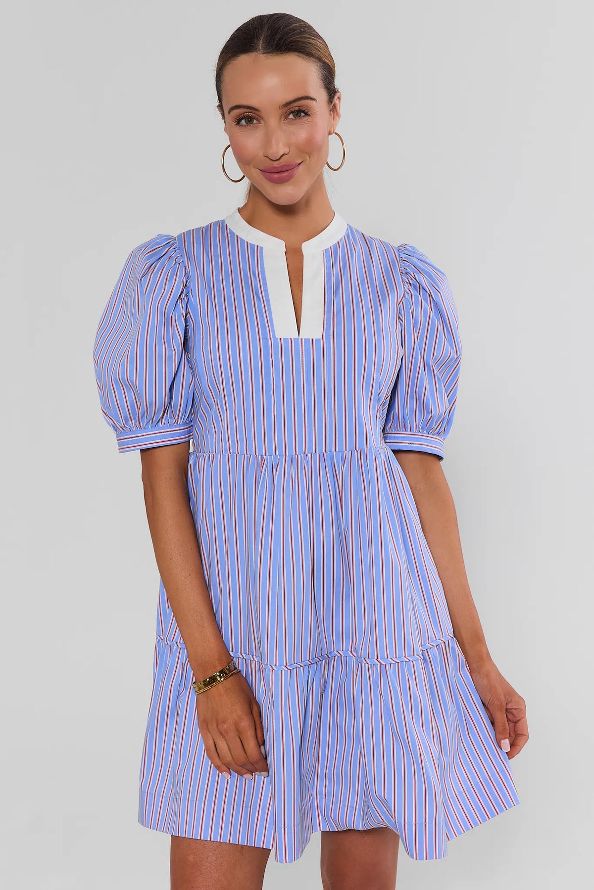 Blue Striped Split Neck Short Dress with puff sleeves and white contrast trim, front view on model | Avara
