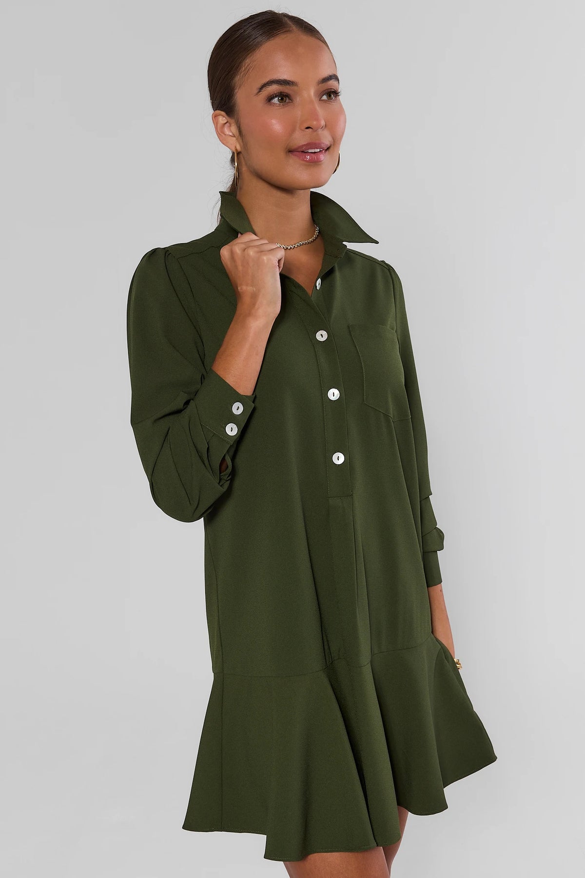 Olive Meagan Drop Waist Dress - Side Angle View showing long sleeves and flared drop-waist hem | Avara