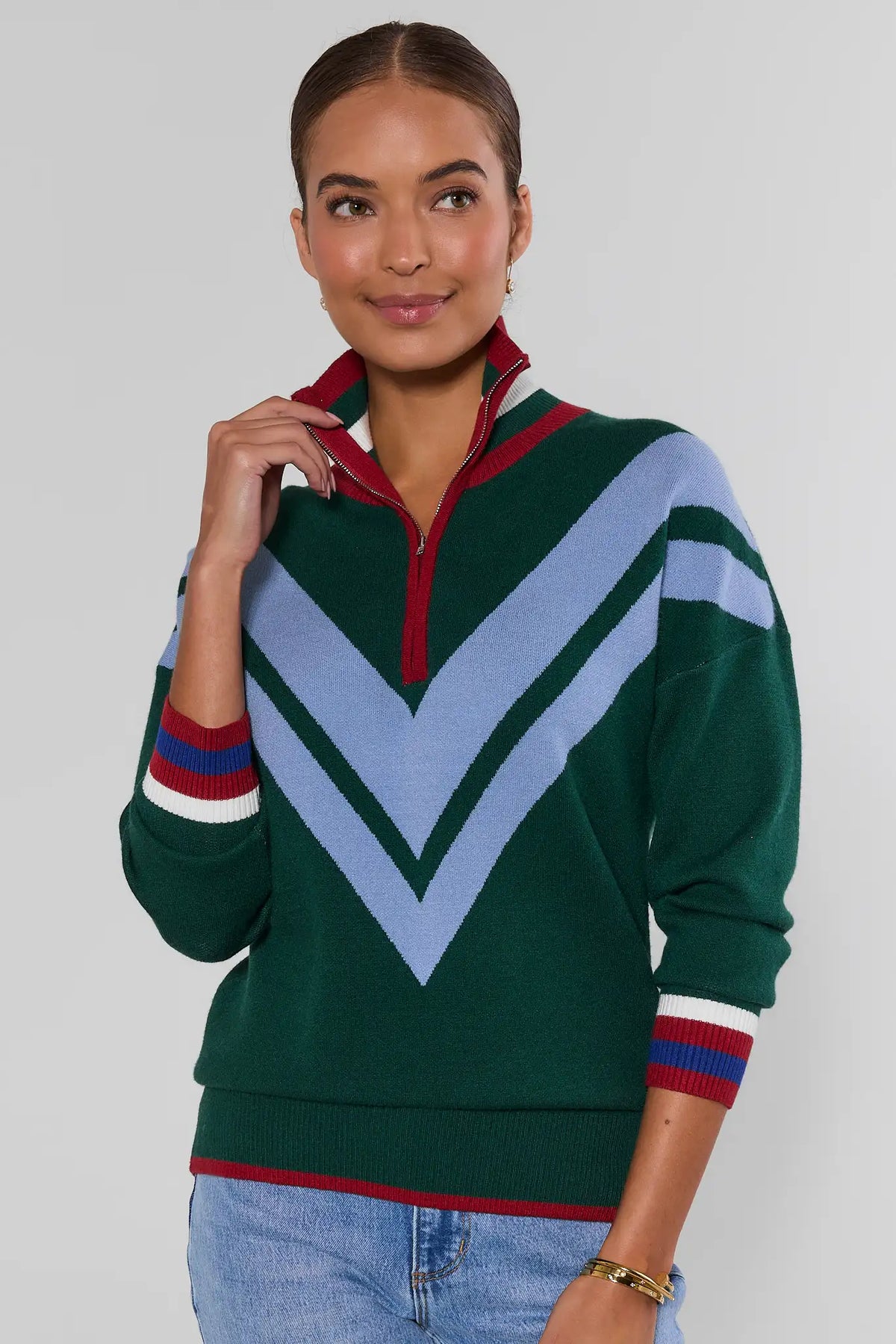 Collin Green Knit Zip Up Sweater with light blue chevron and striped cuffs, paired with light wash jeans - Front View | Avara