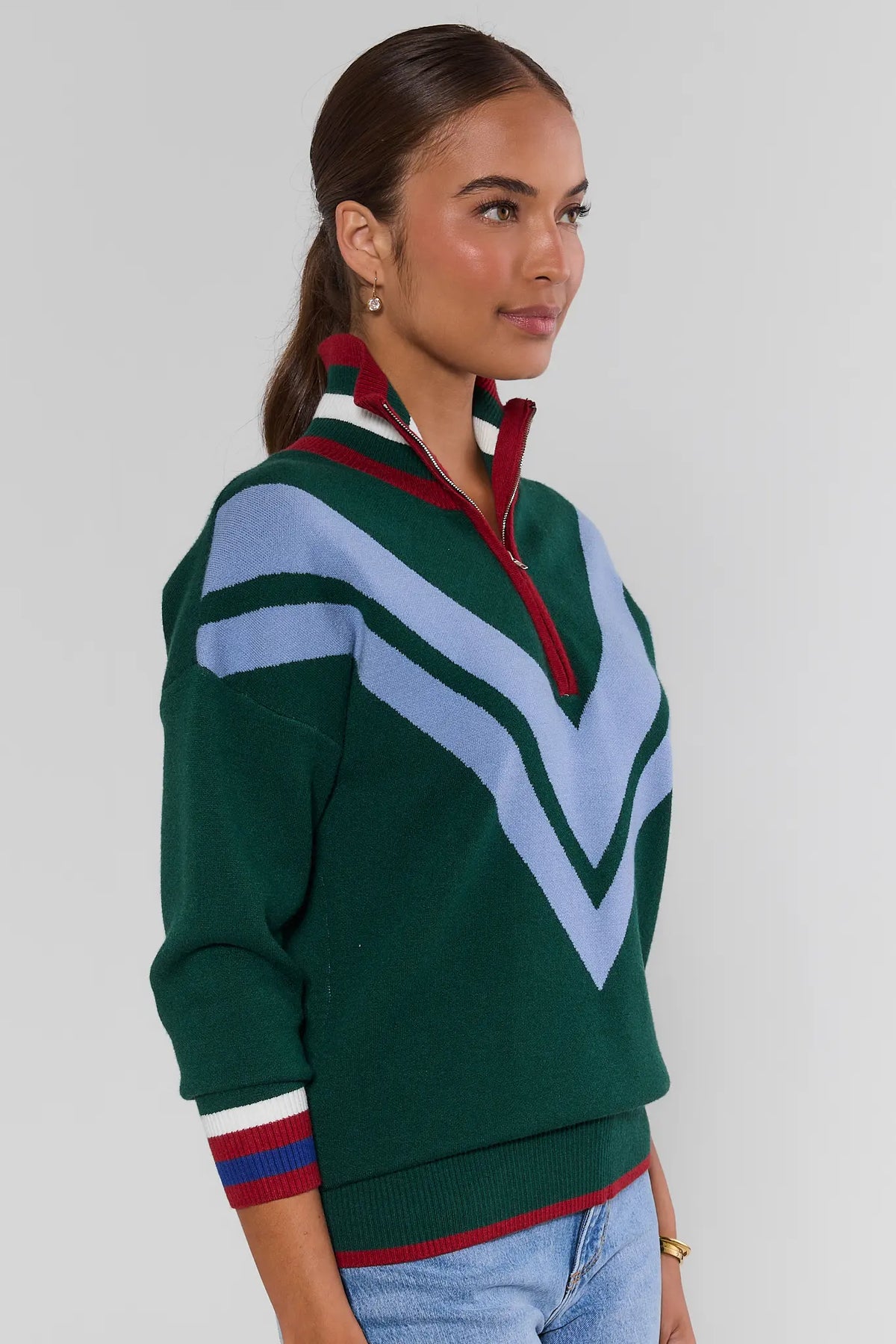 Collin Green Knit Zip Up Sweater green and blue chevron colorblock with striped cuffs, on model - Side Profile View | Avara