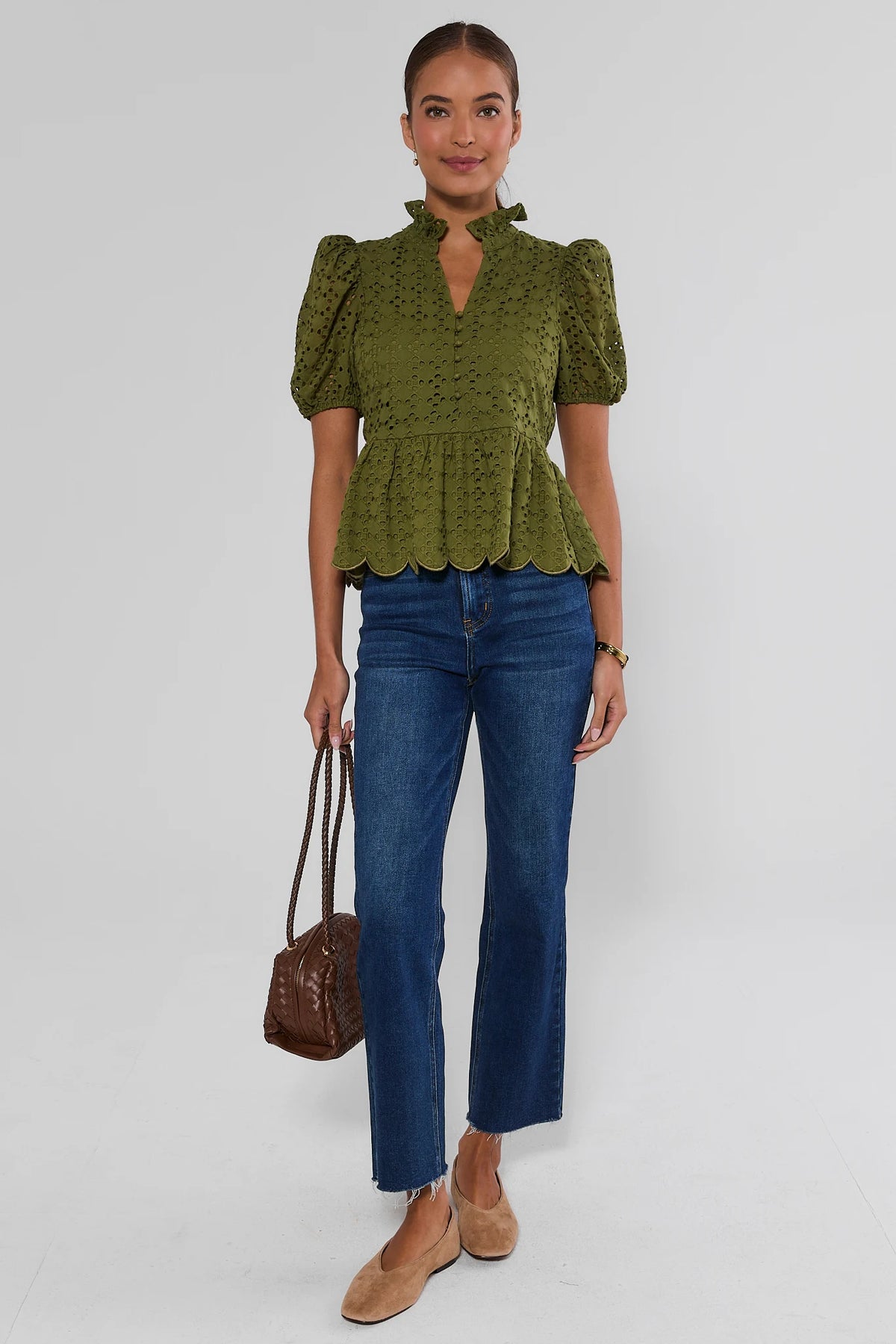 Green eyelet peplum top styled with straight-leg jeans, tan flats, and brown bag - Full Styled Look | Avara