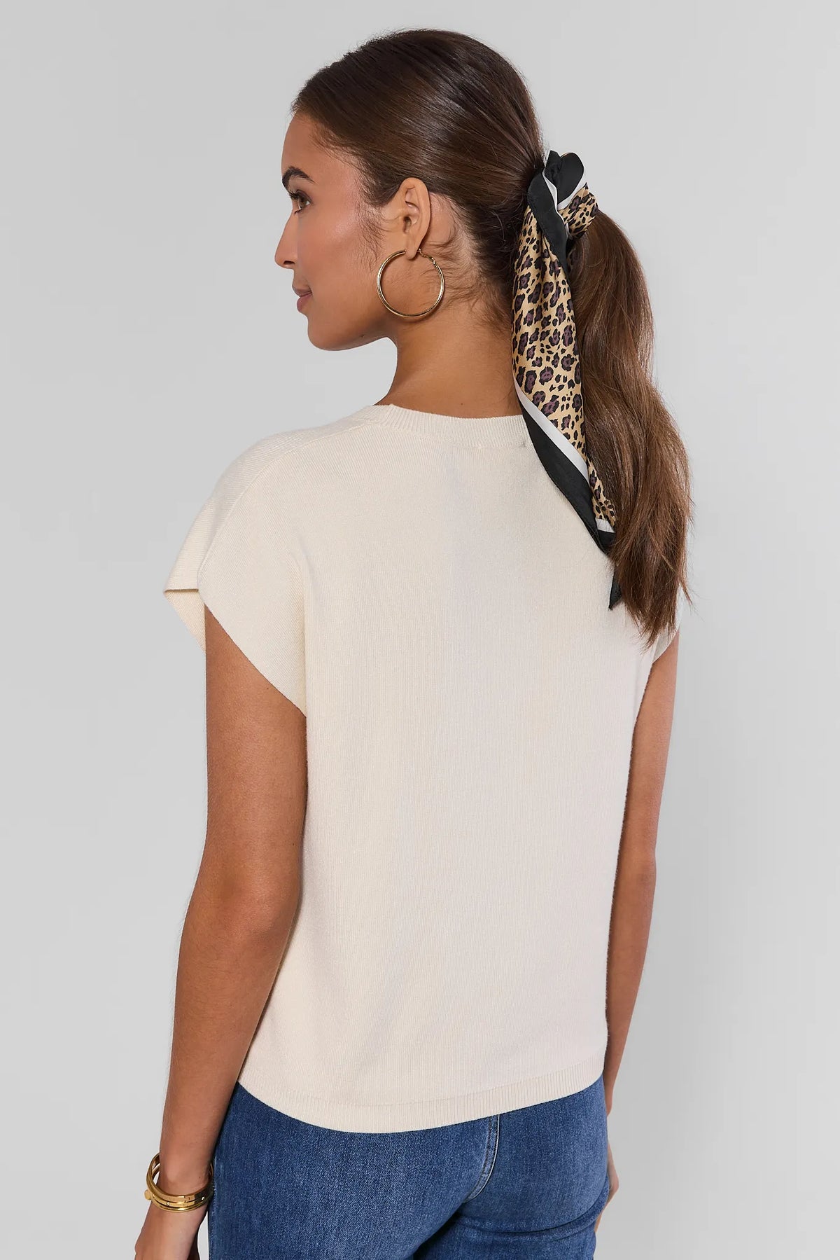 Ivory Knit Crewneck Top back view showing relaxed knit silhouette and short sleeves, styled with denim | Avara