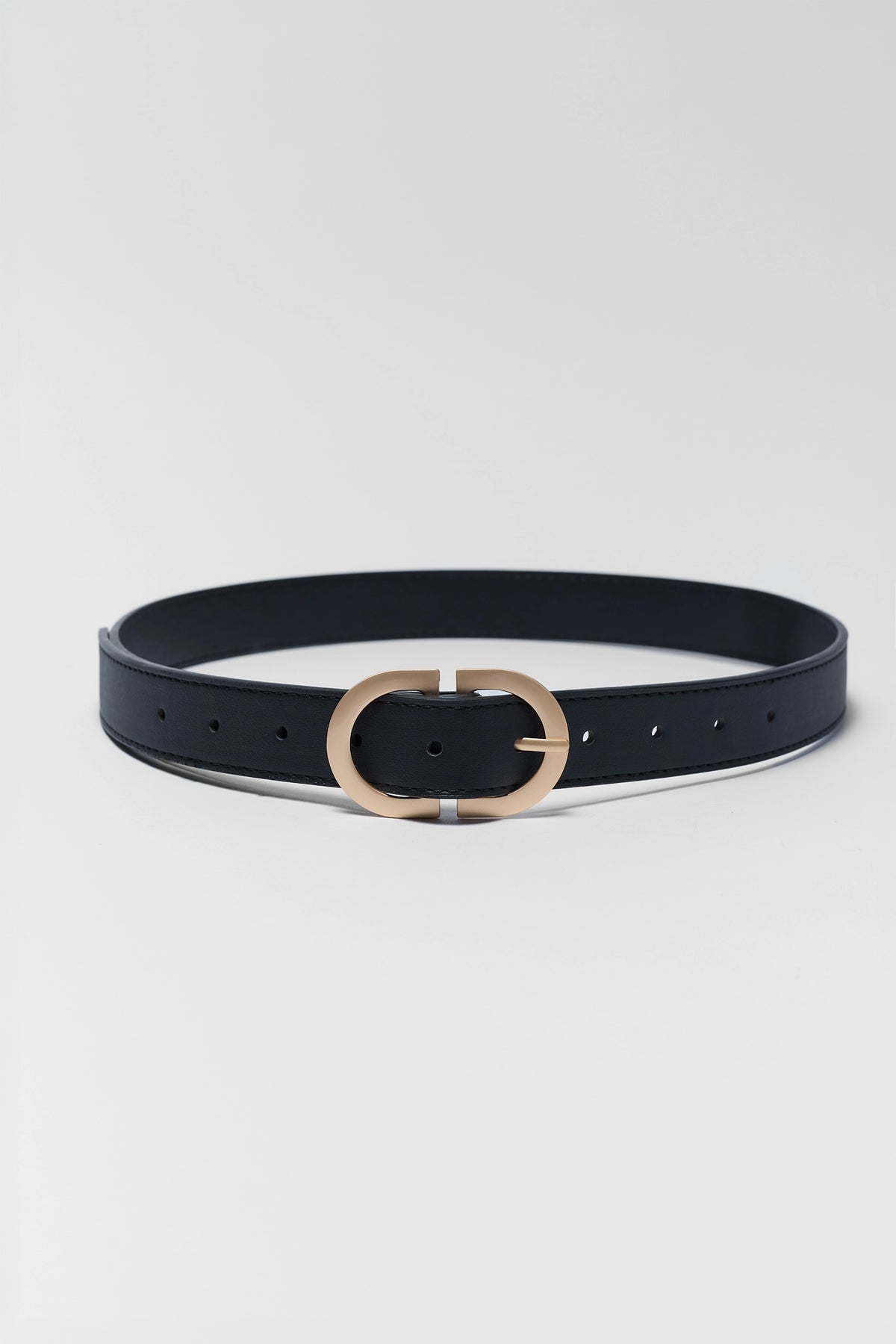 Black Faux Leather Belt with gold-tone oval buckle, flat lay overhead view | Avara