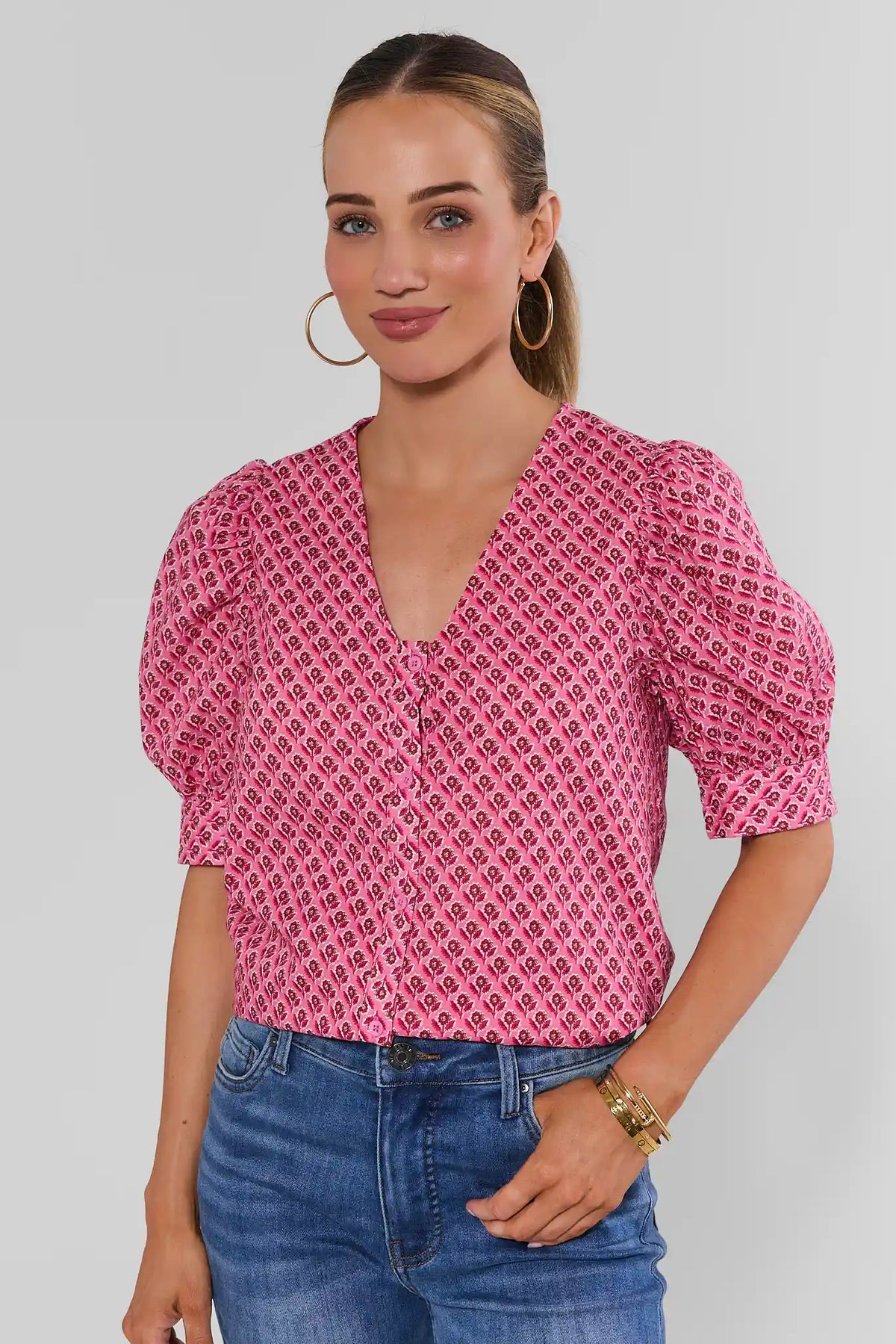 Pink Floral Printed Button-Up Top - Front View, V-Neckline & Puff Sleeves On Model | Avara