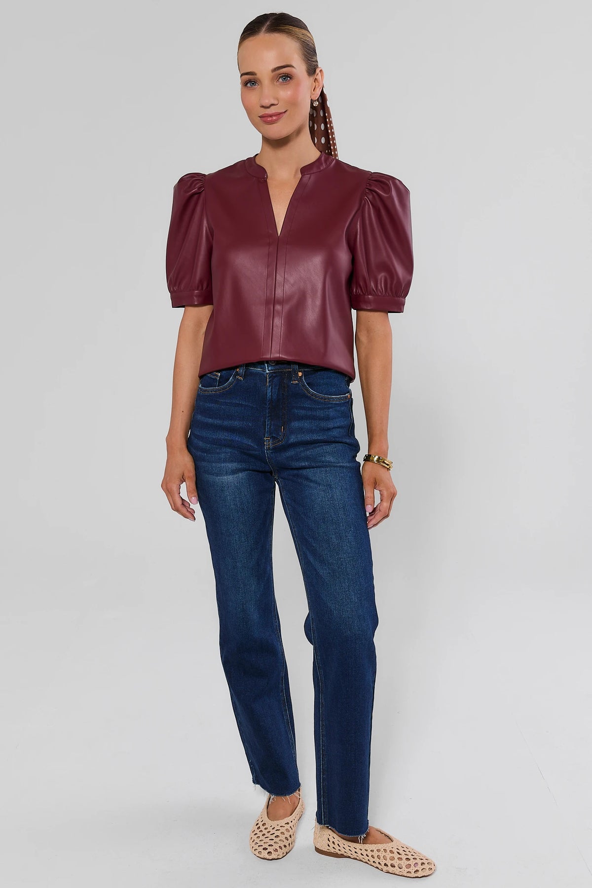 Burgundy Faux Leather Puff Sleeve Top - Full Length Front View, Styled with Dark Wash Jeans | Avara