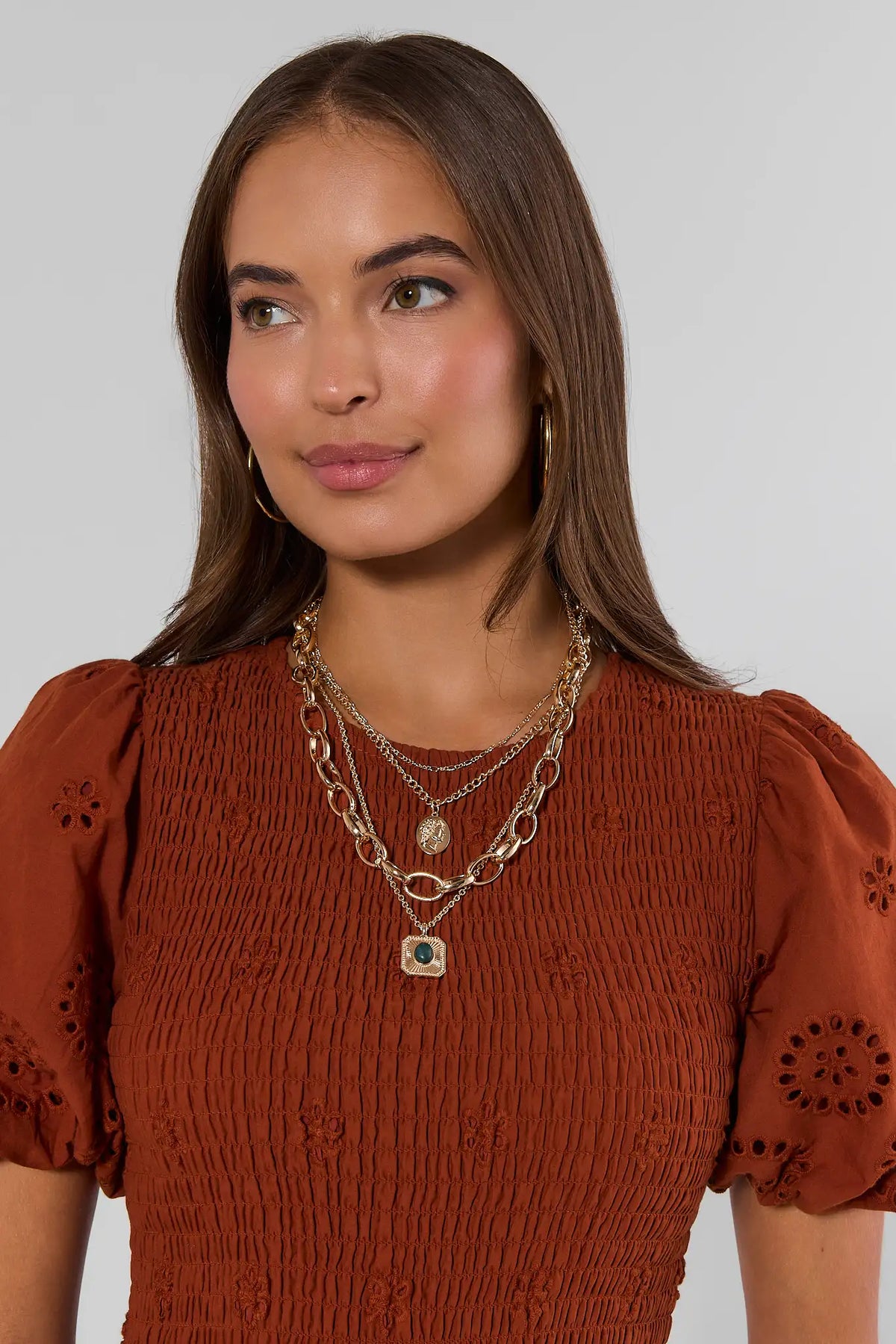 Gold Layered Chain Necklace Stack On Model - Styled Look with Pendant Detail | Avara