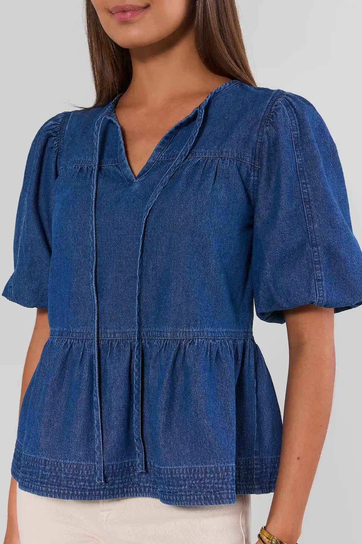 Blue Denim Peplum Top Split Neck & Puff Sleeve Close-Up Detail | Avara