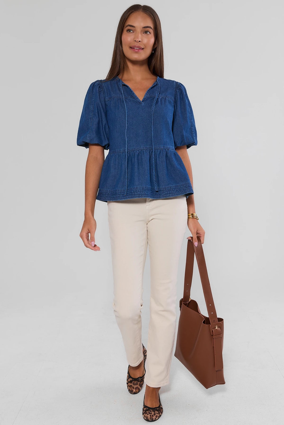 Blue Denim Split Neck Peplum Top - Styled Full Length with Cream Trousers | Avara