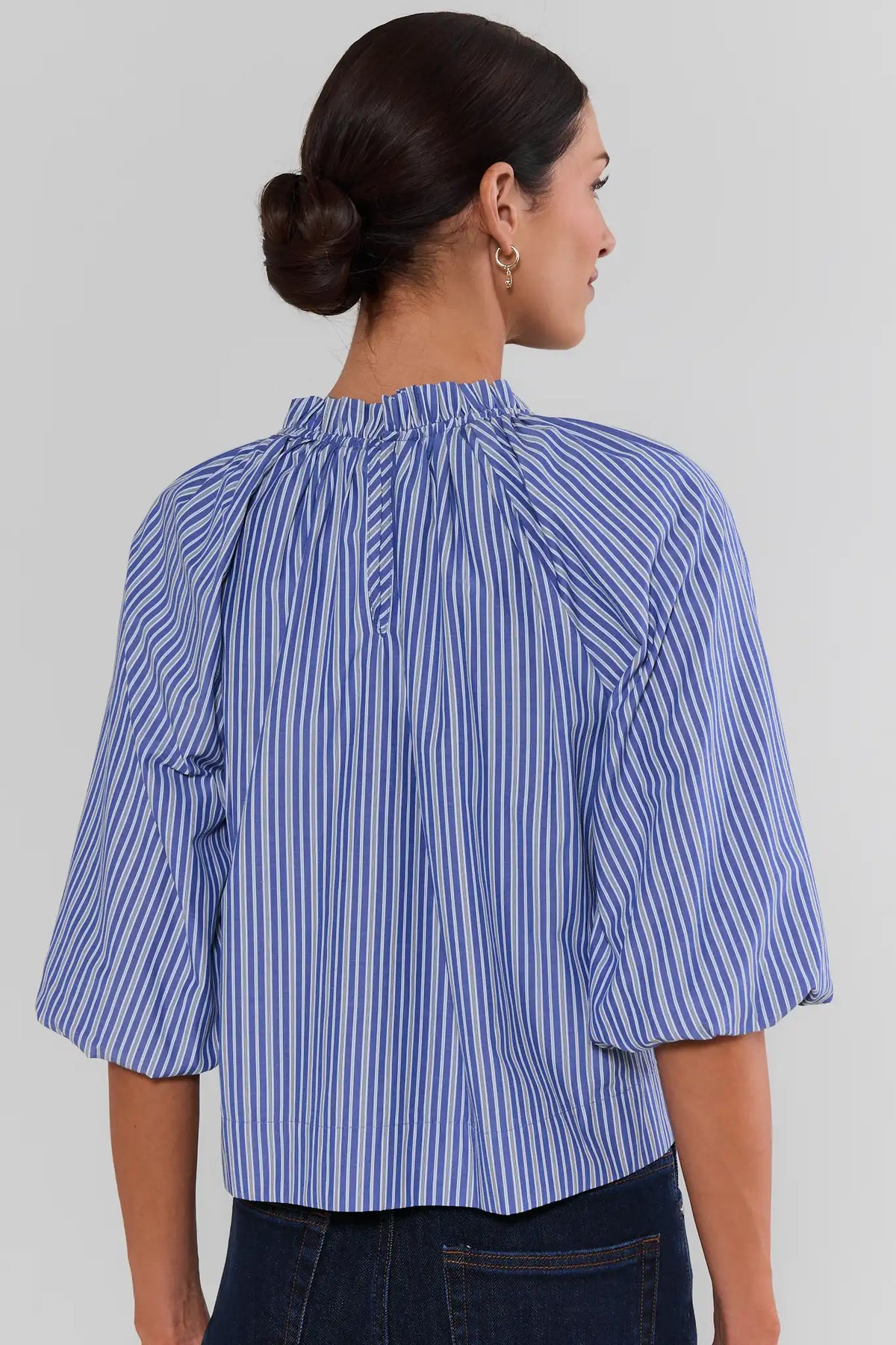 Blue Striped Ruffle Collar Top showing gathered back yoke, elbow-length puff sleeves, and relaxed silhouette - Back View | Avara