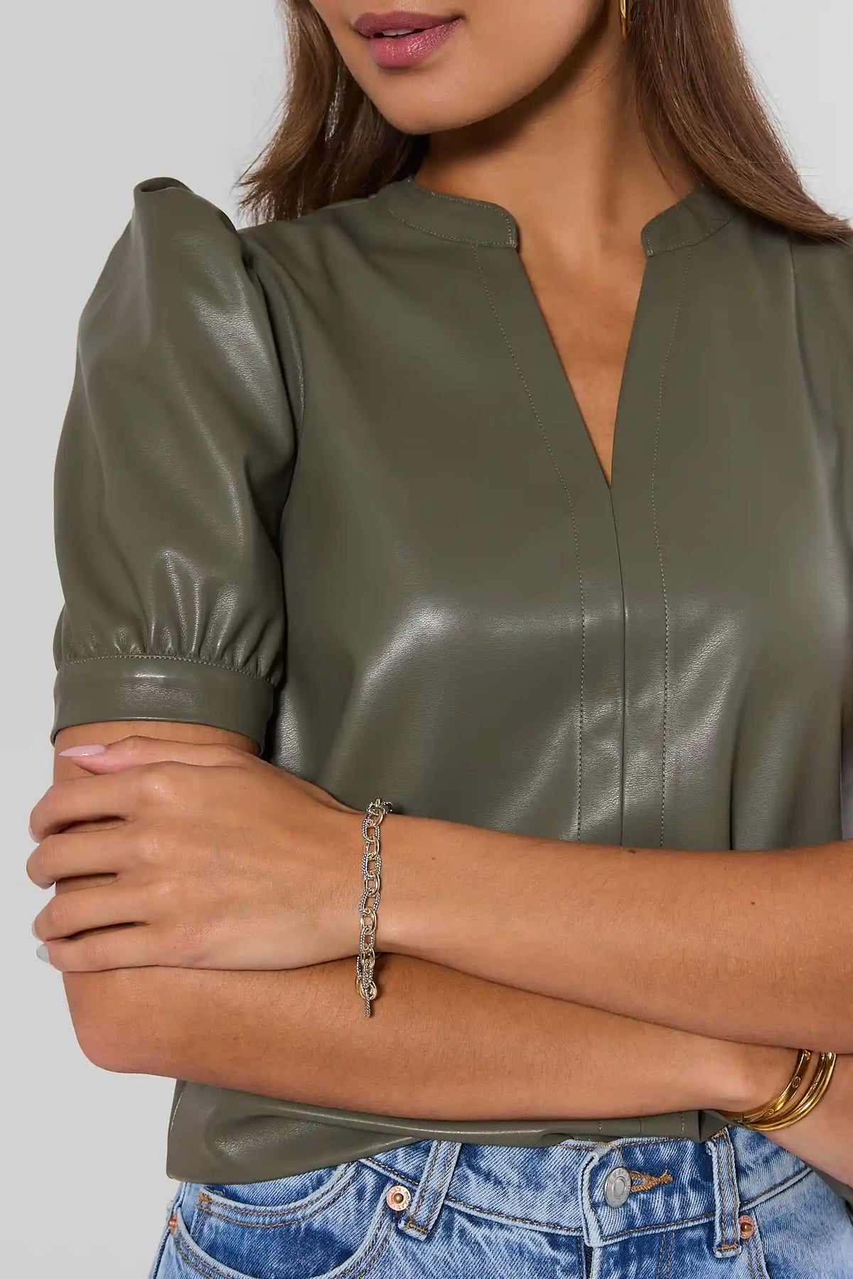 Gold Two Tone Chain Bracelet Worn on Model's Wrist - Styled Look | Avara