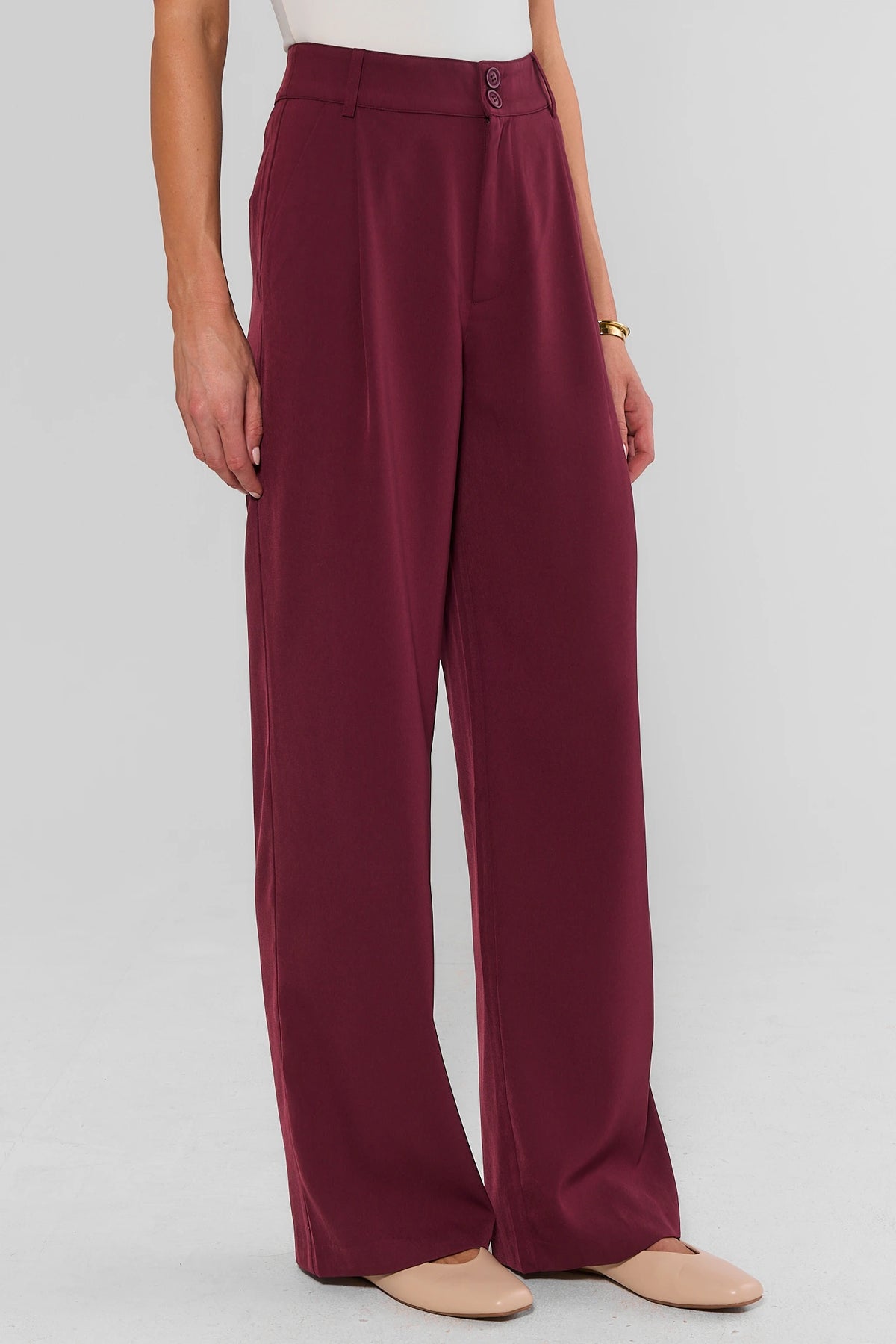 Burgundy High-Rise Wide Leg Pants - Side View, Pleated Silhouette | Avara