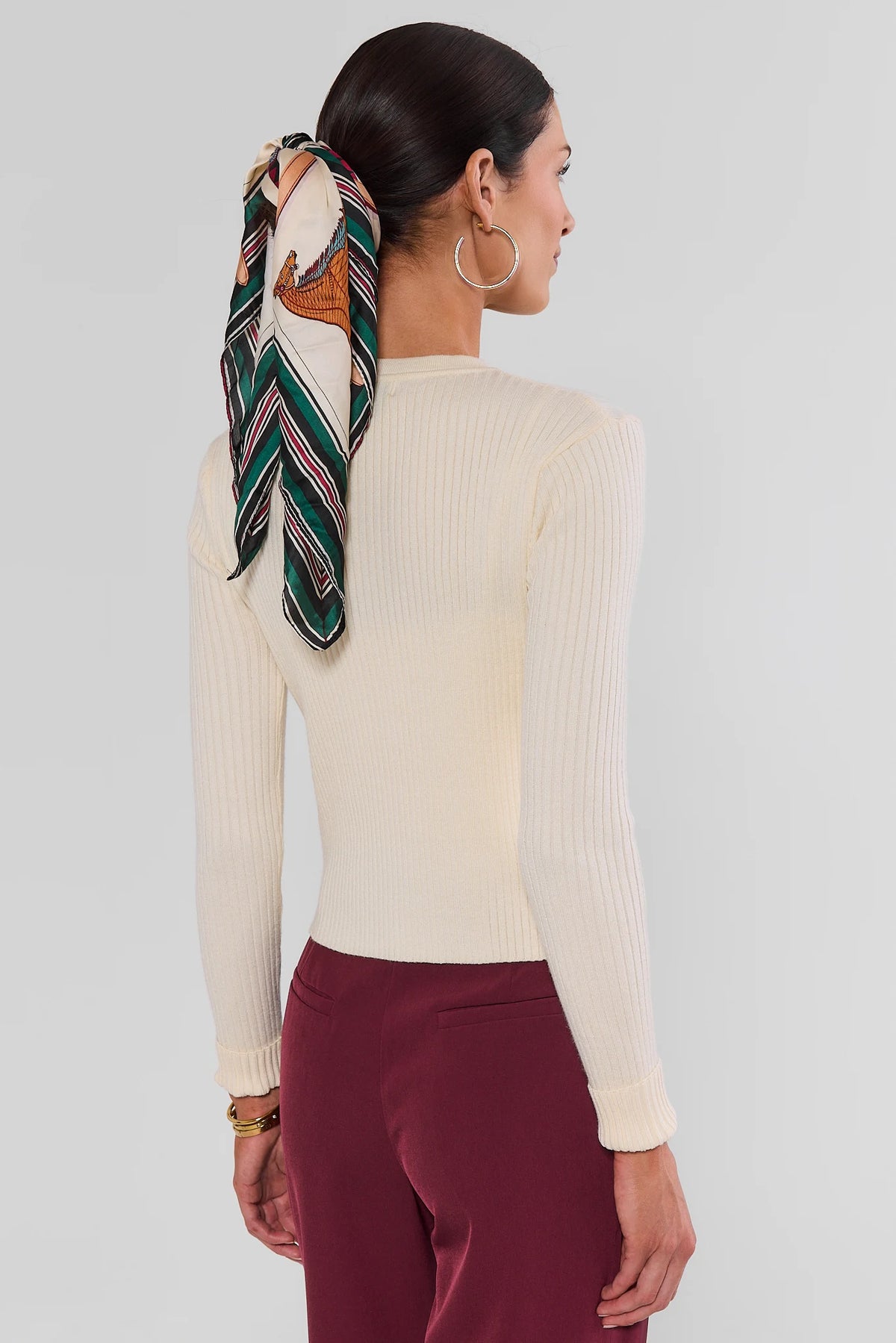 Cream Ribbed Cardigan - Back View, Clean Ribbed Knit Silhouette Styled with Burgundy Trousers | Avara