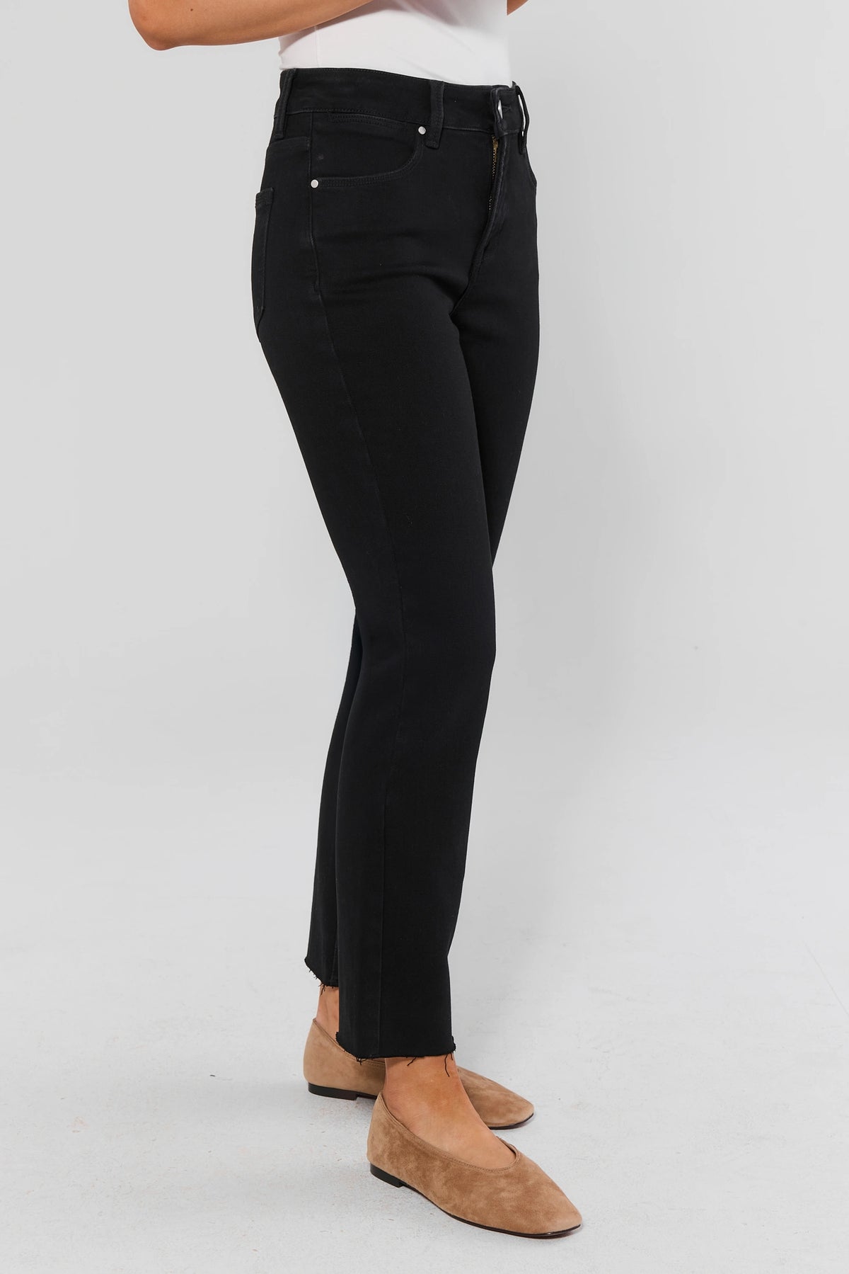 Black Cropped Kick Flare Jeans with raw frayed hem and high rise - Side Profile On Model | Avara