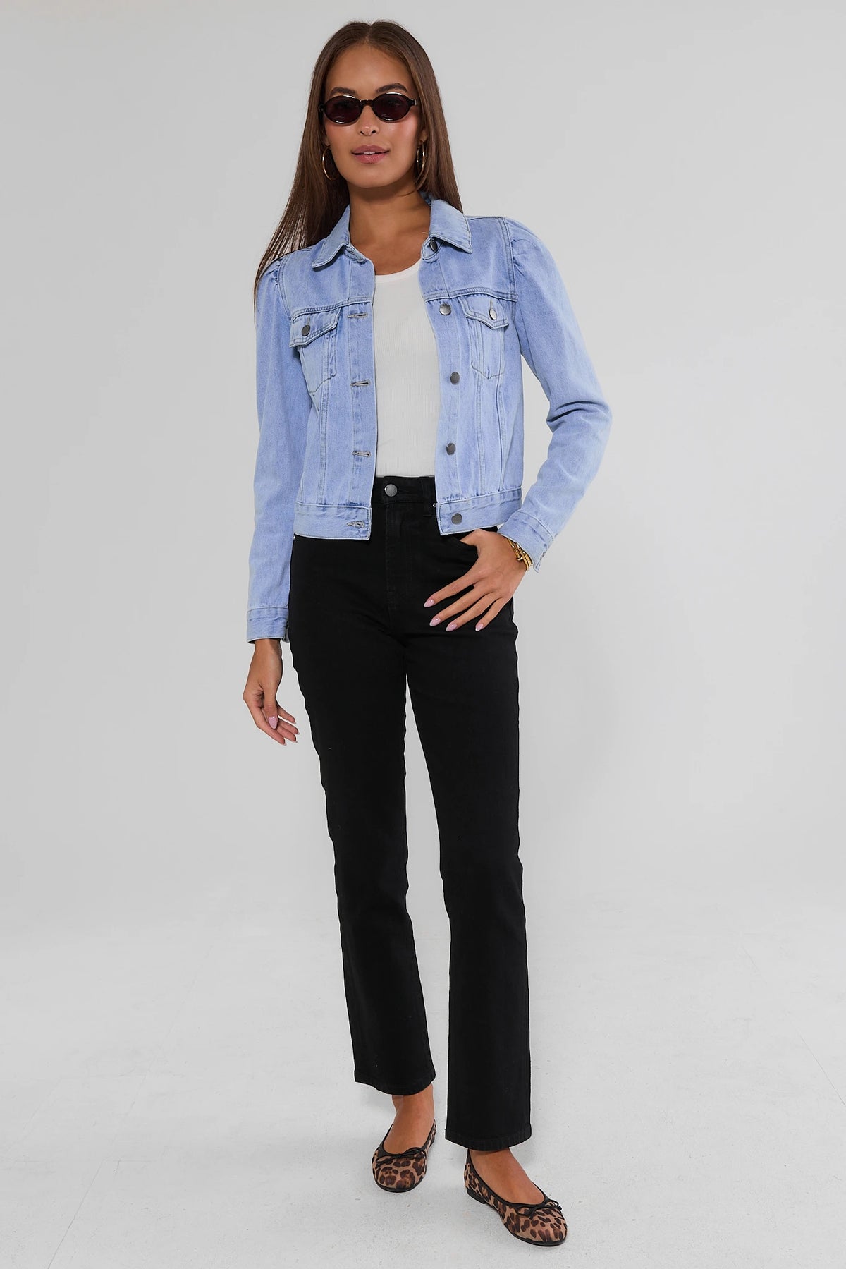 Black Straight Leg Jeans Styled with Light Wash Denim Jacket - Full Length Outfit On Model | Avara