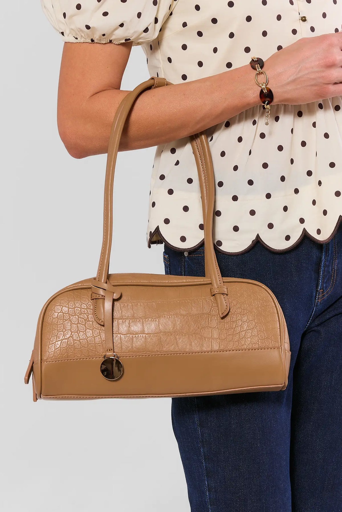 Brown Textured Faux Leather Bag Styled On Model with Denim - On Model View | Avara