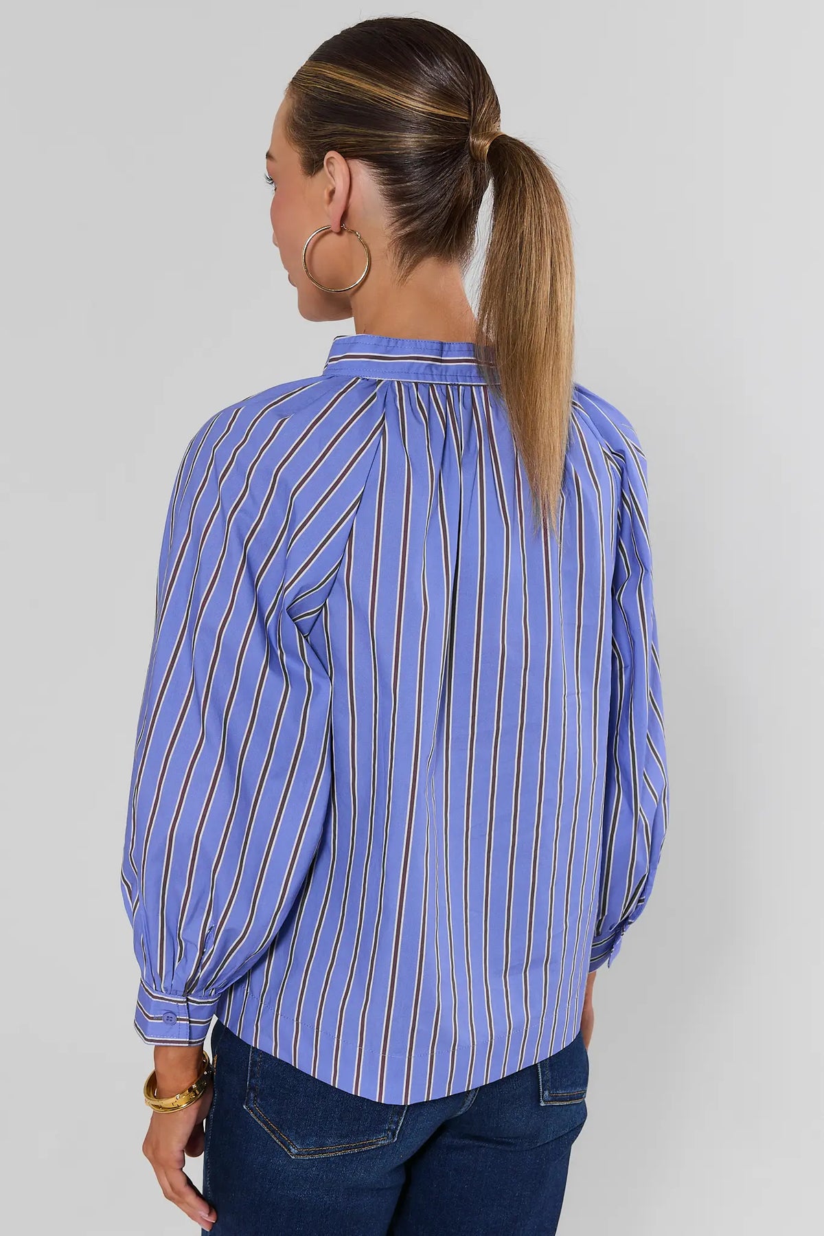 Blue Striped Long Sleeve Top - Back View On Model with Dark Wash Denim | Avara