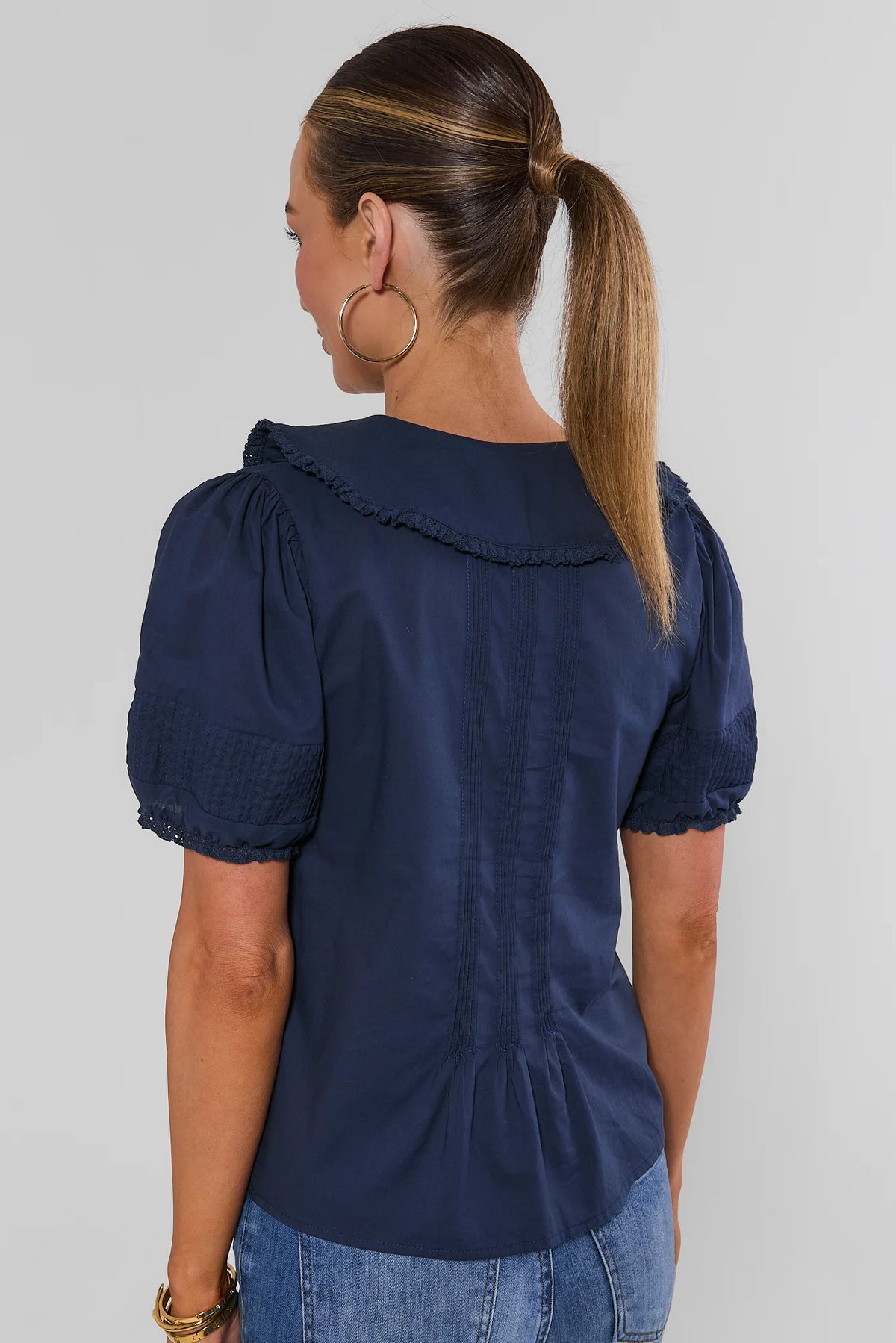Navy Puff Sleeve Button-Up Top - Back View with Pintuck Detail | Avara