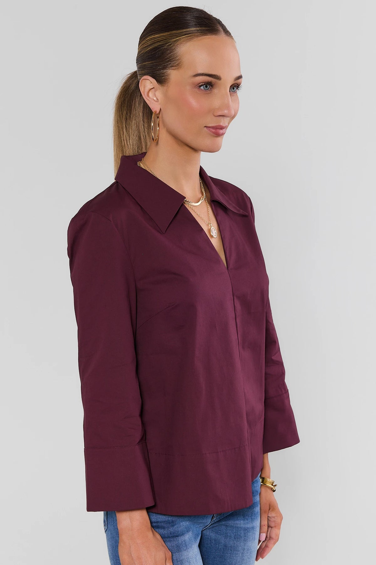 Maroon Collared Women's Top - Side Profile View, 3/4 Sleeve Detail | Avara