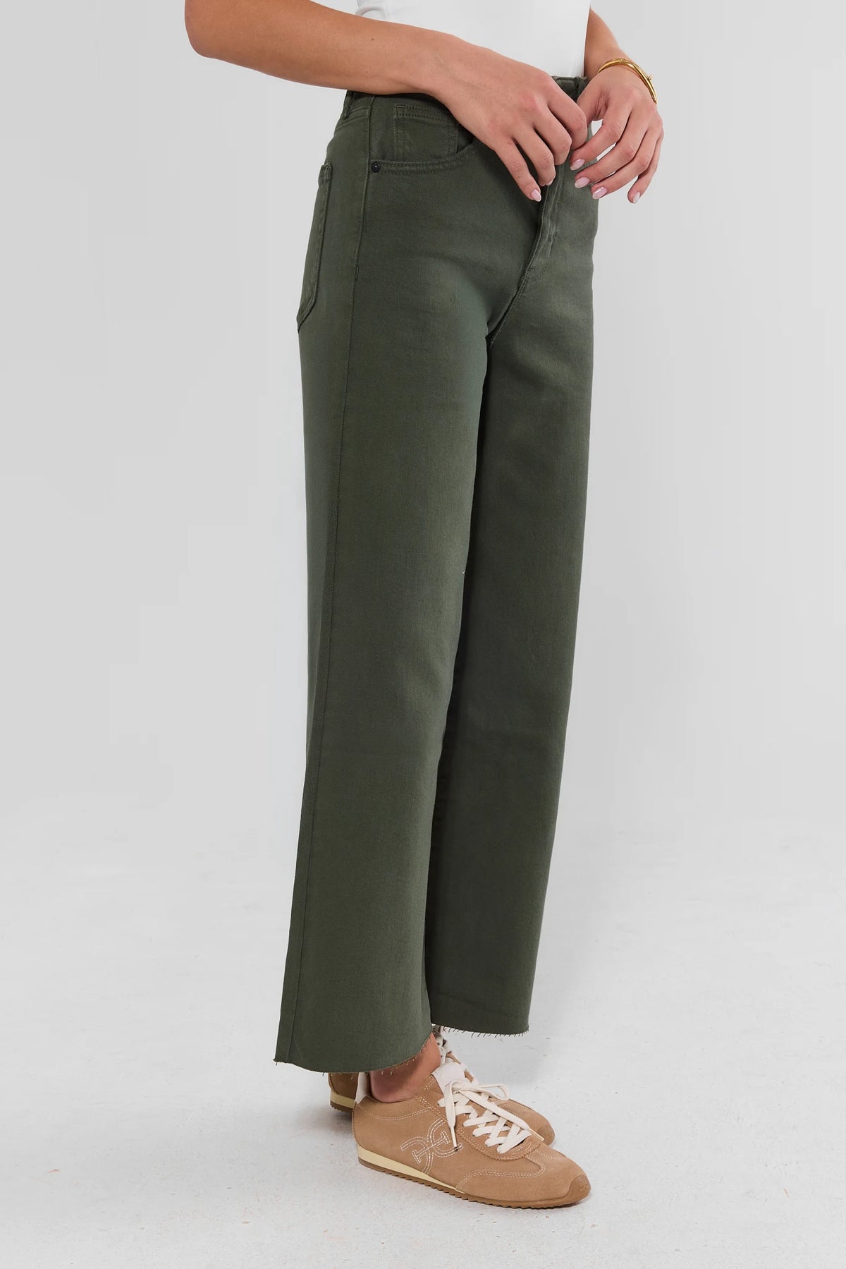 Kimberly Dark Olive Wide Leg Jeans - Side Profile View, High Rise Raw Hem On Model | Avara