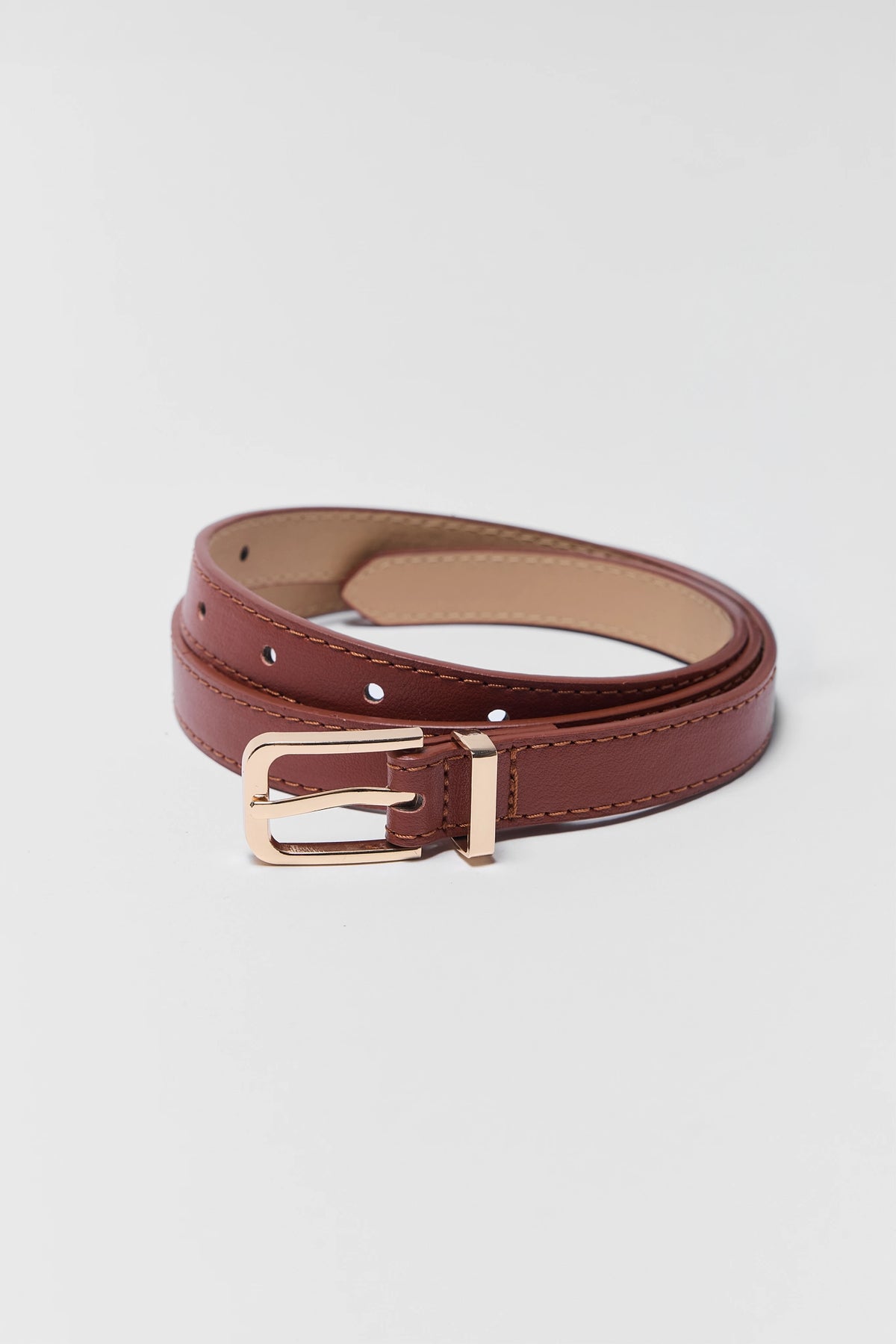 Brown Faux Leather Skinny Belt with Gold Buckle - Coiled Product View | Avara