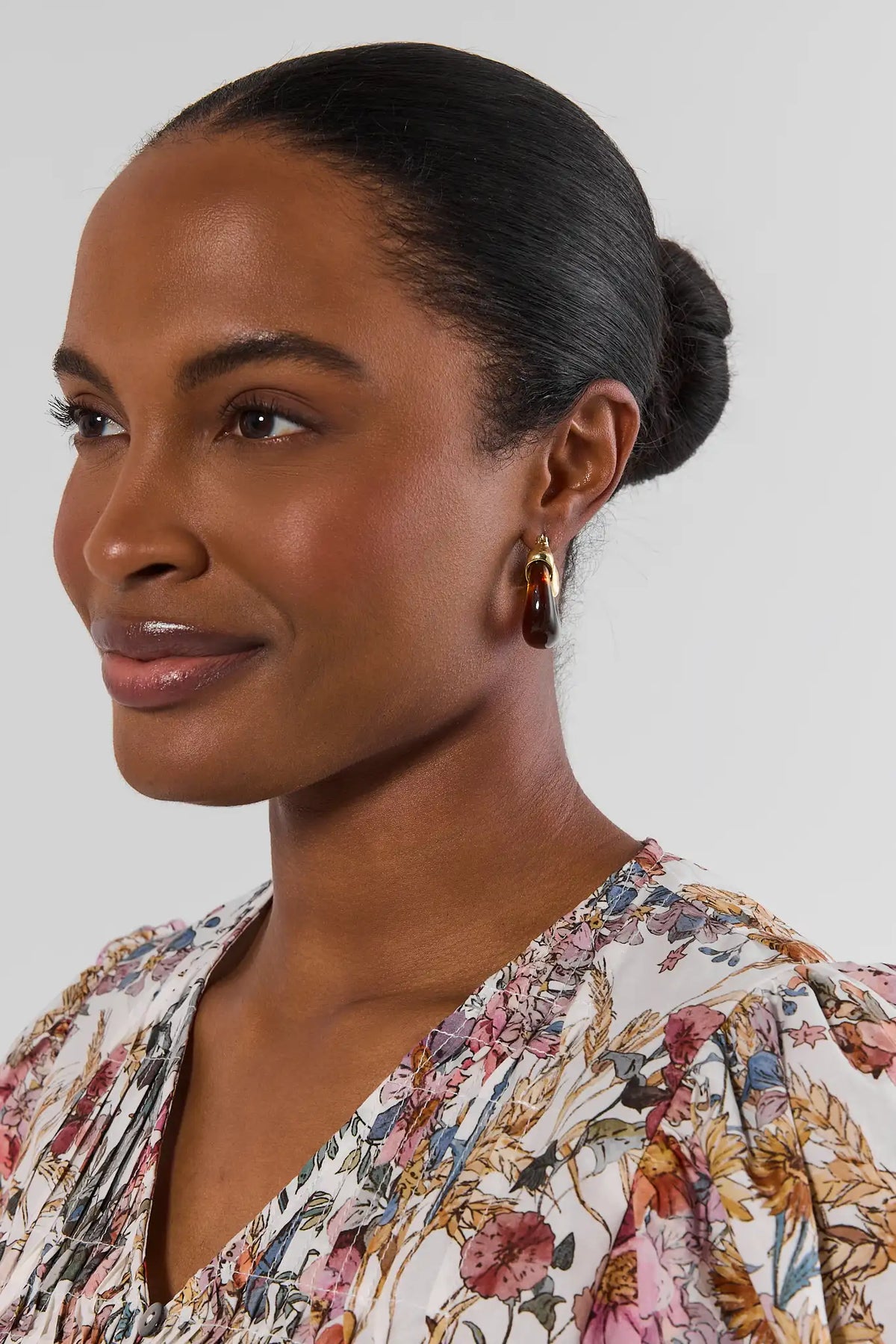 Tortoise Acrylic Hoop Earrings - Side Profile On Model with Floral Top | Avara