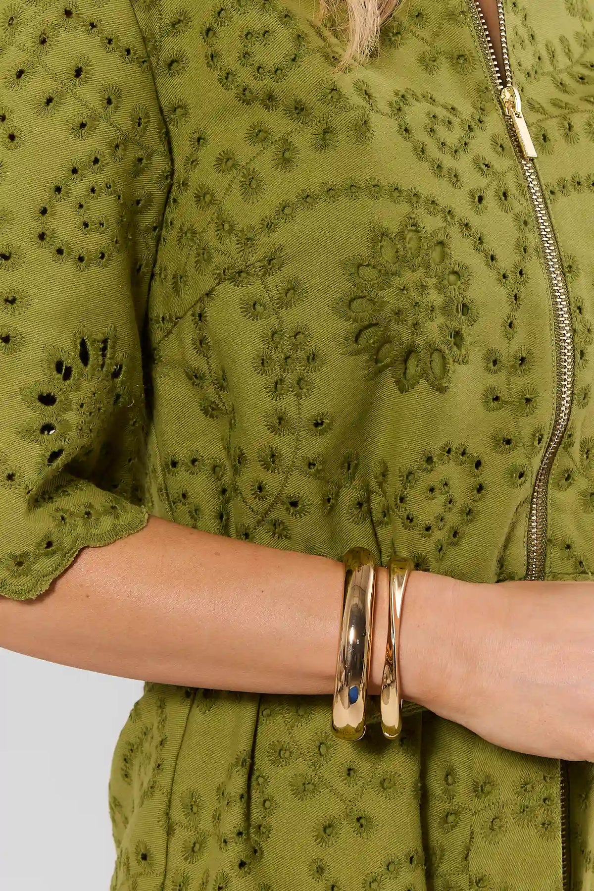 Gold Wavy Bangle Set Worn on Wrist - On Model Detail | Avara