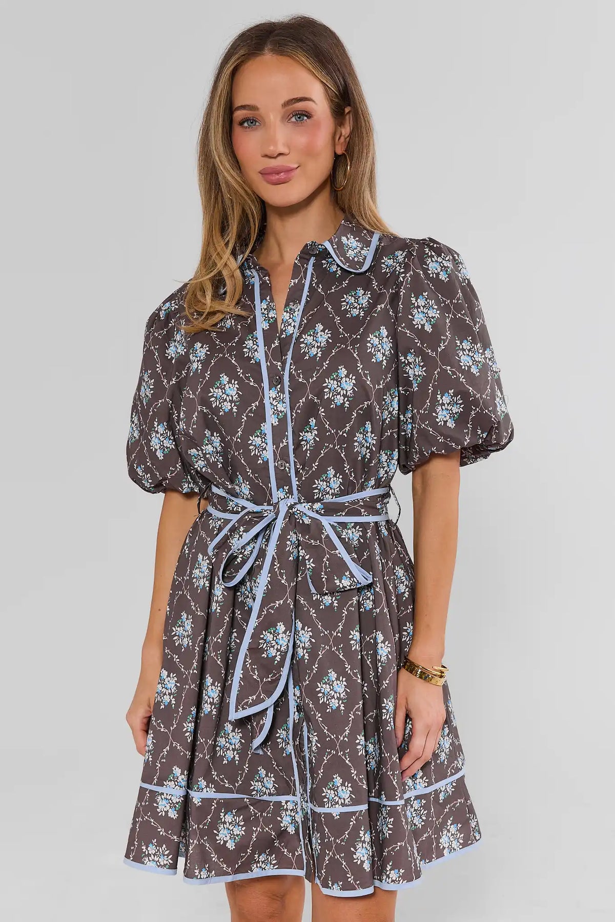 Brown Floral Print Short Dress with Puff Sleeves and Blue Contrast Piping - Front View | Avara