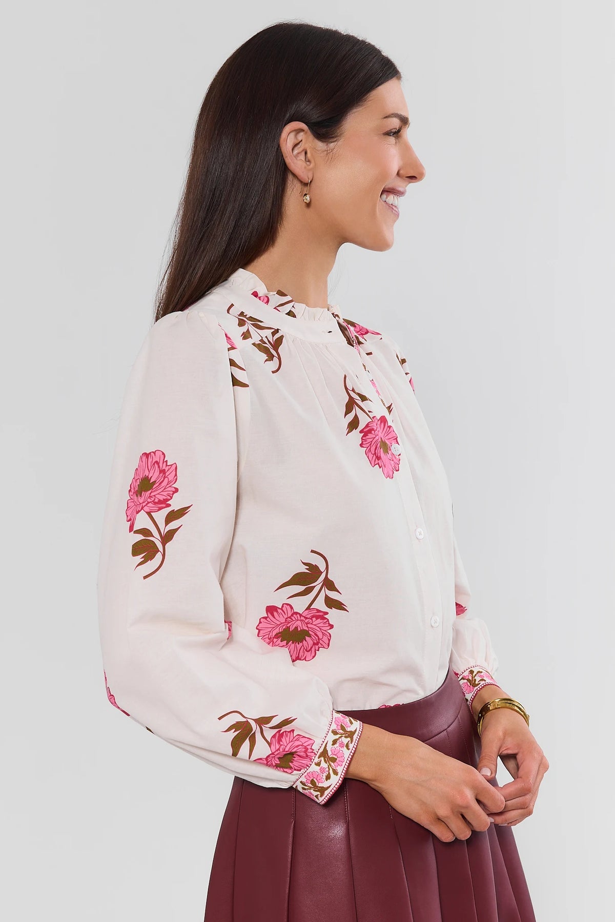 White Floral Long Sleeve Button-Up Top - Side Profile View with Burgundy Skirt | Avara