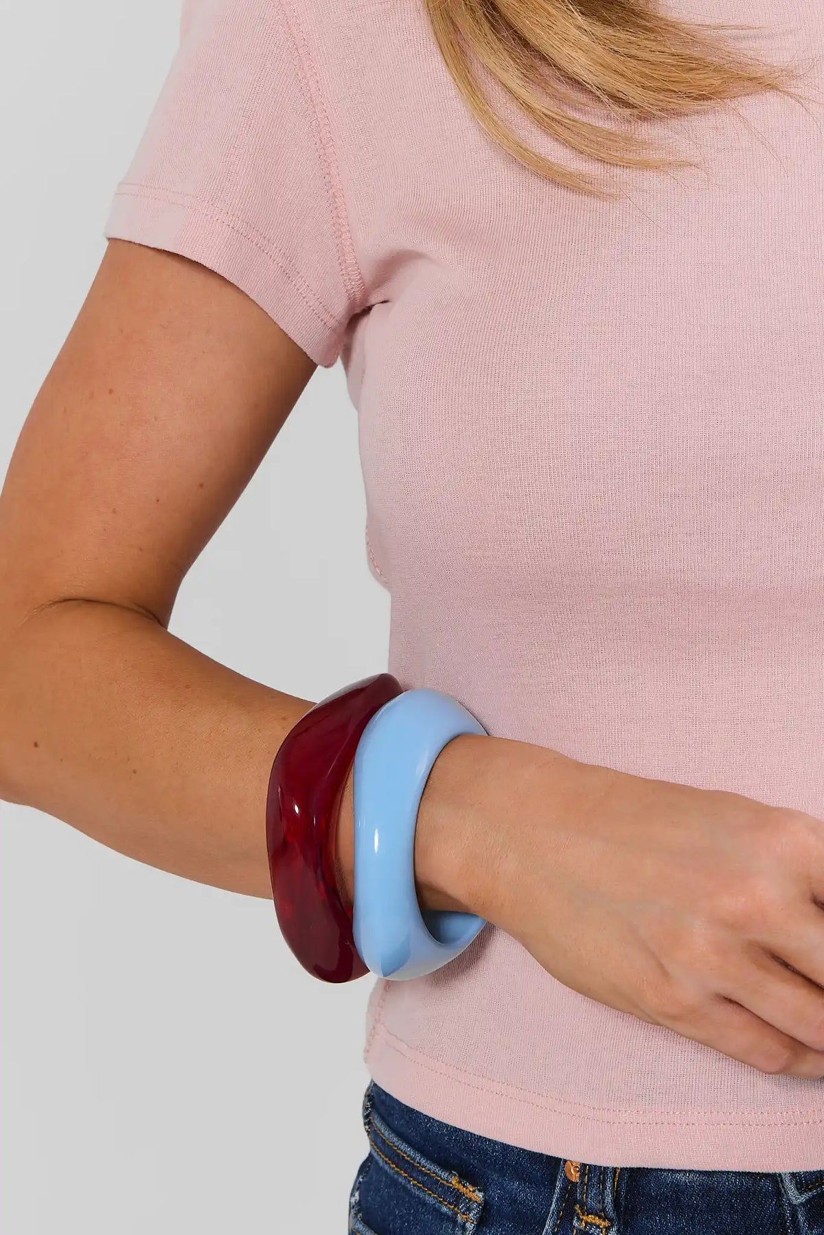 Blue and Burgundy Acrylic Bangle Set Stacked on Model's Wrist - On Model | Avara