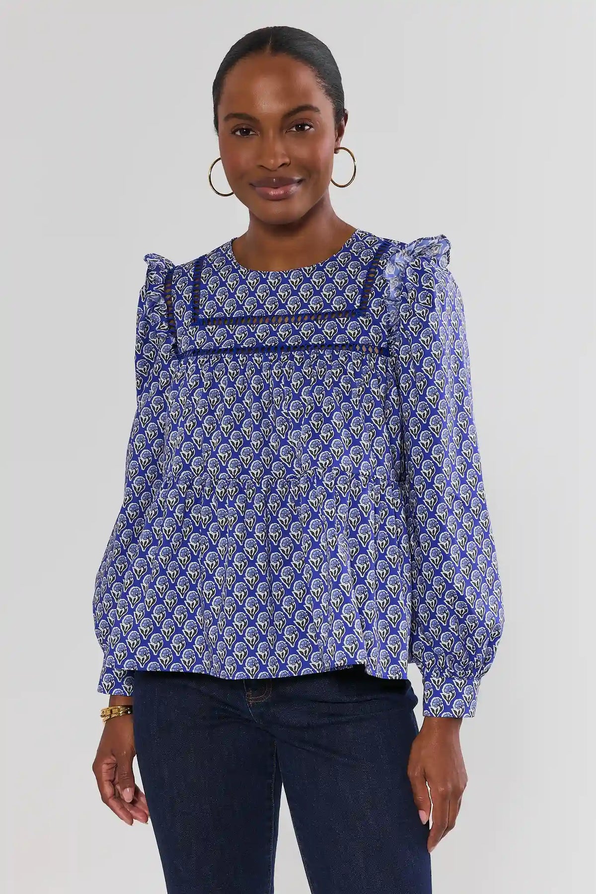 Blue Floral Print Long Sleeve Ruffle Top - Front View On Model | Avara