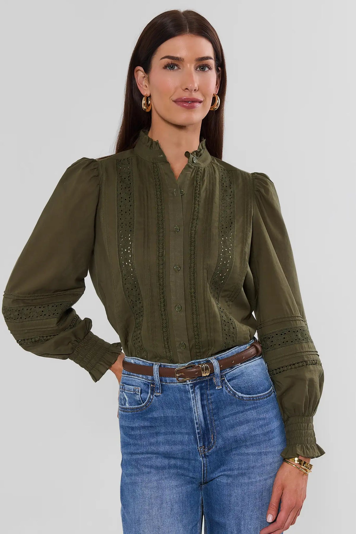 Olive Green Eyelet Lace Button-Up Top - Front View On Model with Blue Jeans and Brown Belt | Avara