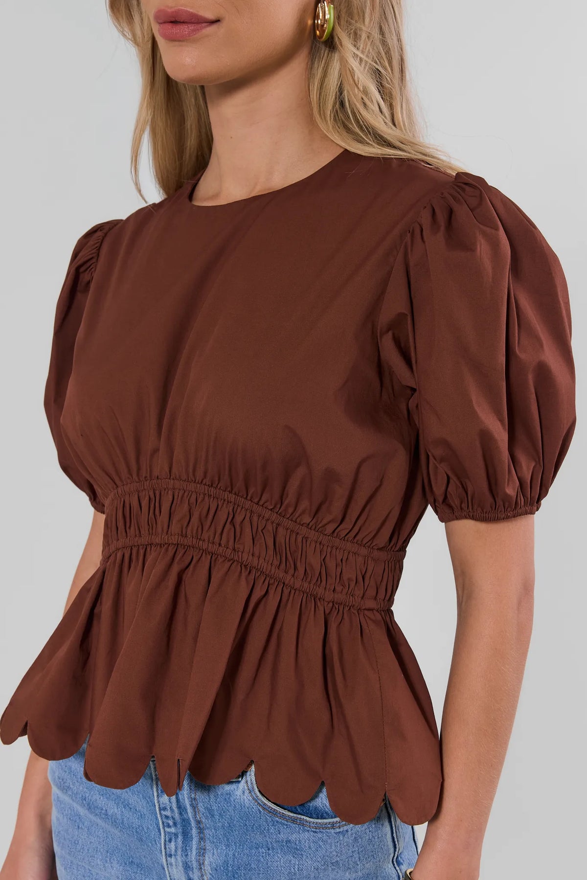 Brown Peplum Top - Smocked Waist & Scalloped Hem Close-Up Detail | Avara