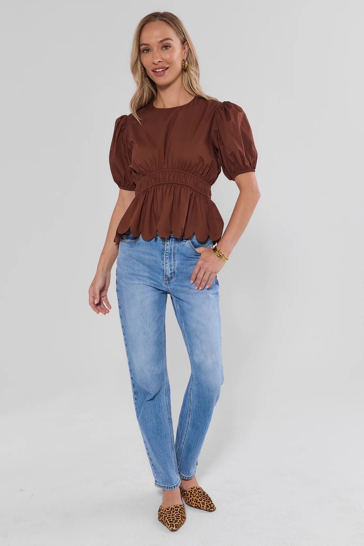 Brown Scalloped Peplum Top with Puff Sleeves - Front View On Model | Avara