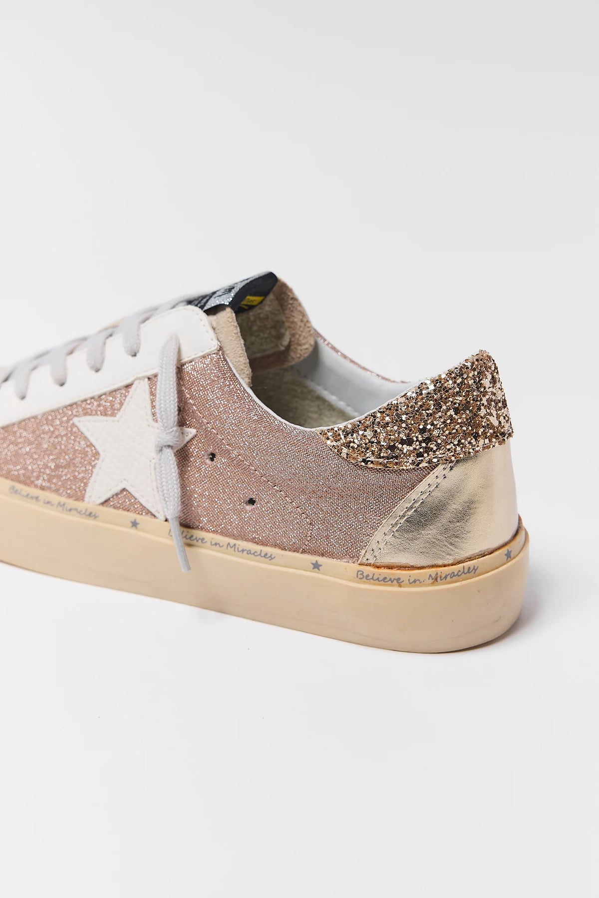 Champagne Glitter Star Sneakers - Back Detail, Gold Glitter Counter Close-Up | Avara