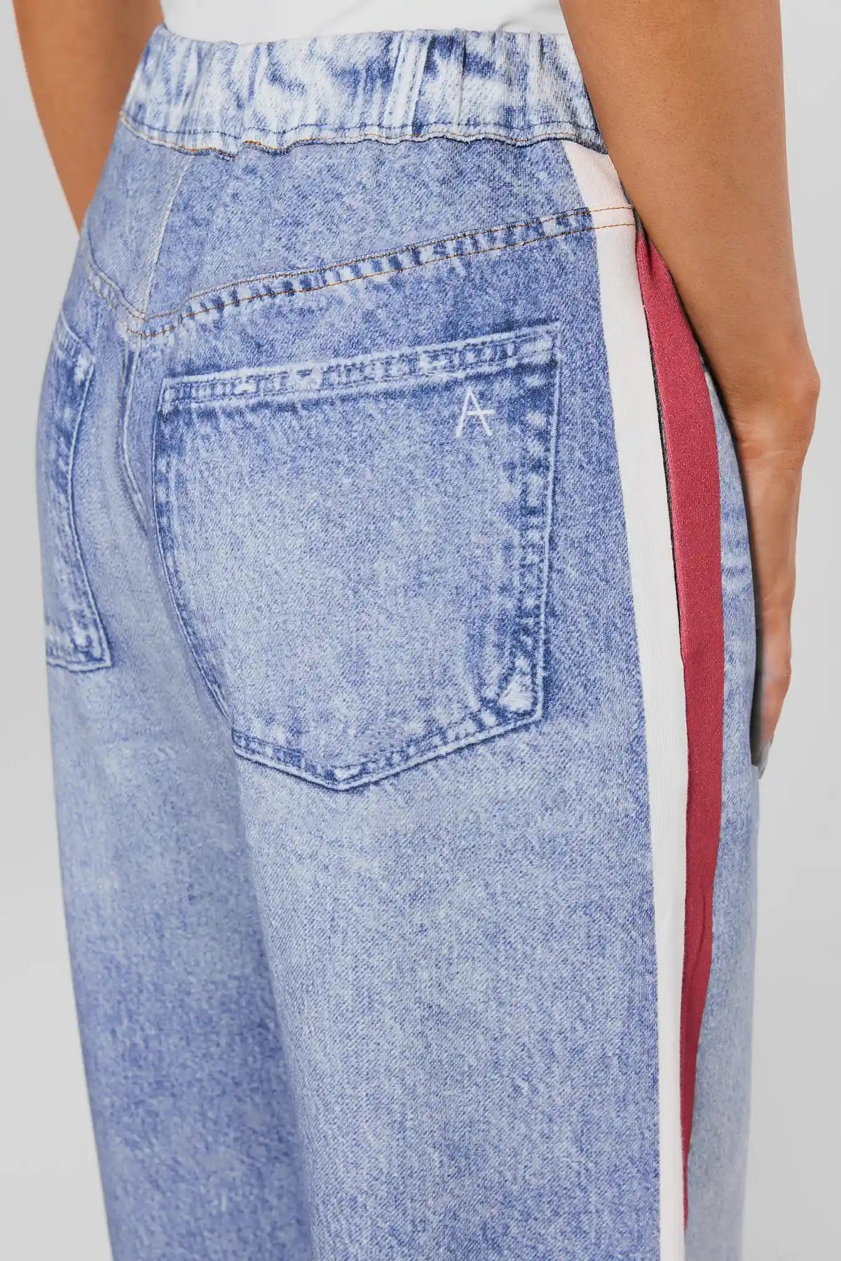 Maeve Red Stripe Wide Leg Track Pants - Back Pocket & Side Stripe Close-Up On Model | Avara