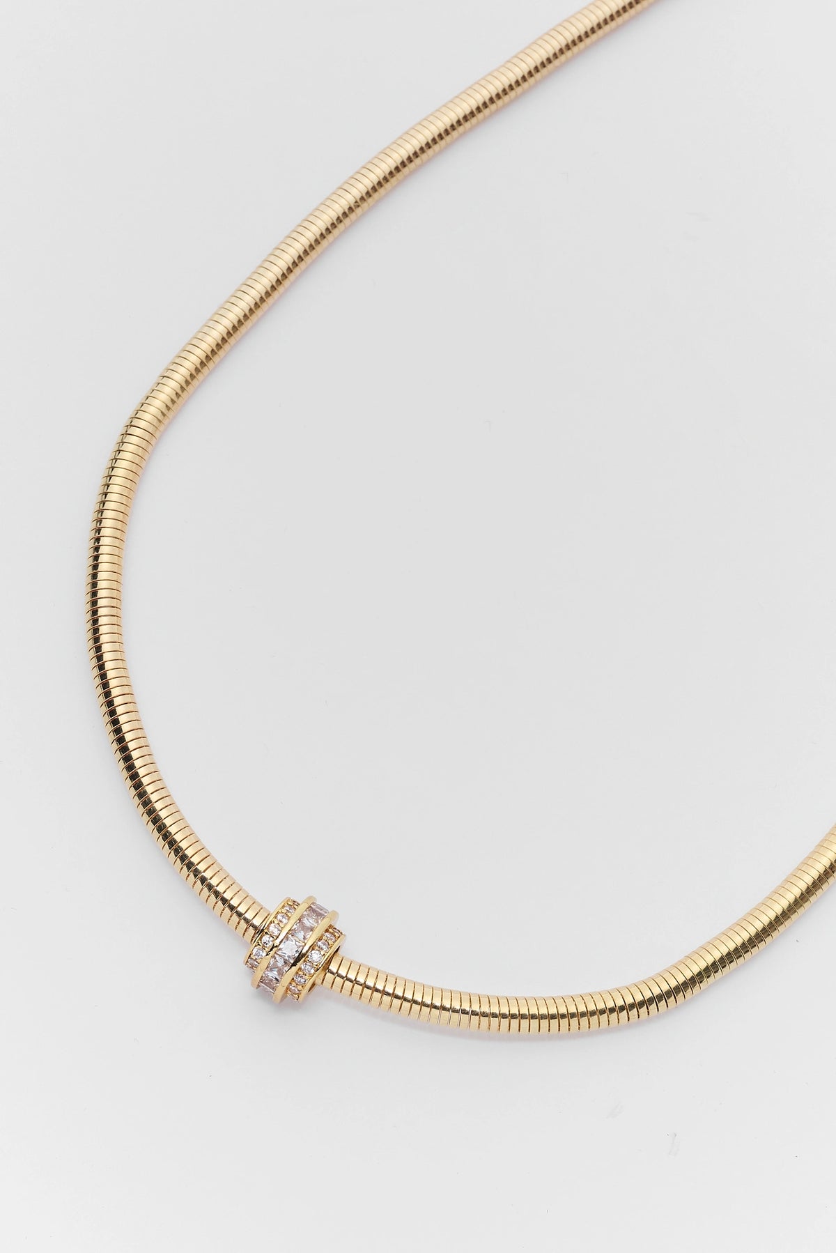 Gold Snake Chain Necklace Crystal Charm Detail Close-Up - Detail View | Avara