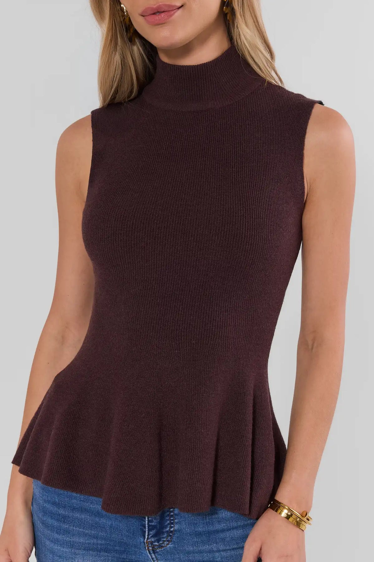Brown Knit Sleeveless Turtleneck Top - Close-Up Peplum & Turtleneck Detail | Avara