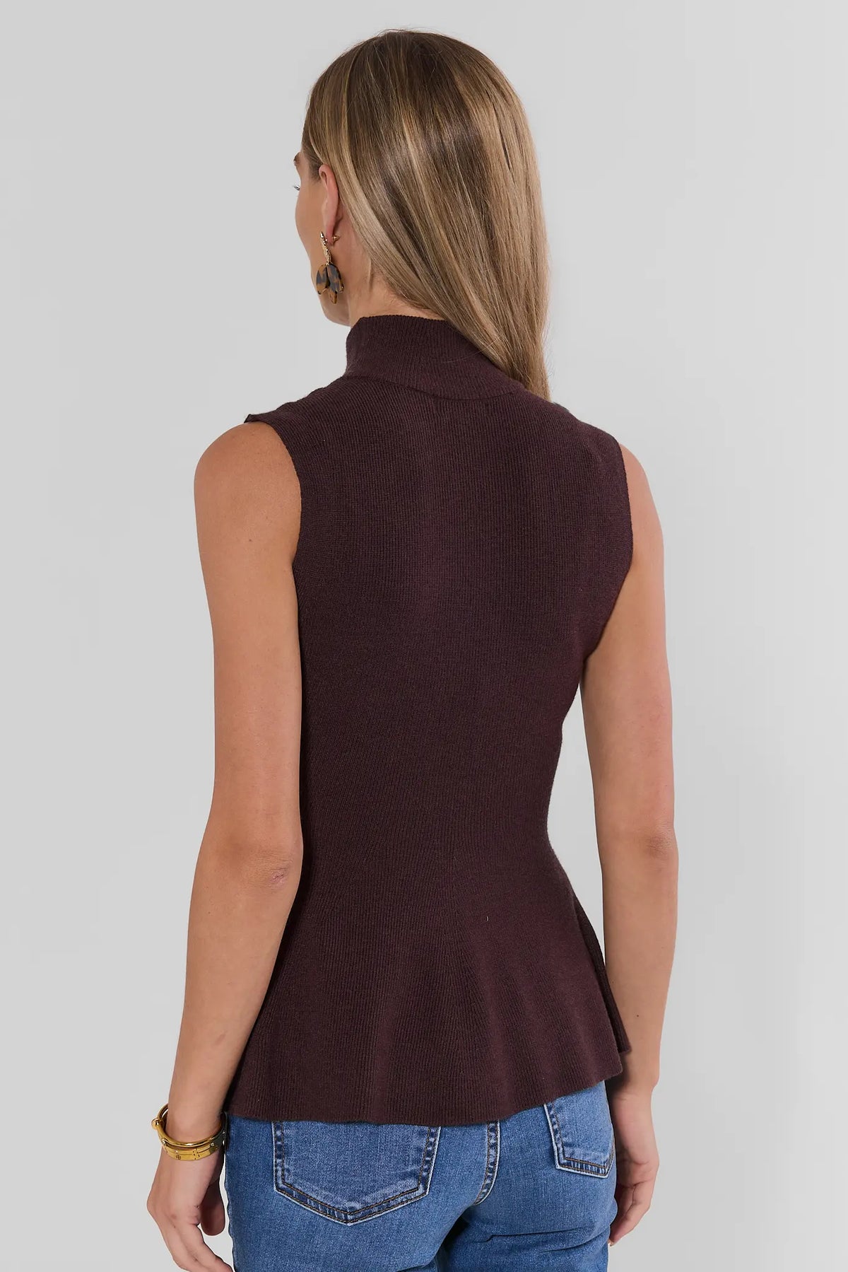 Brown Knit Sleeveless Turtleneck Peplum Top - Back View On Model | Avara