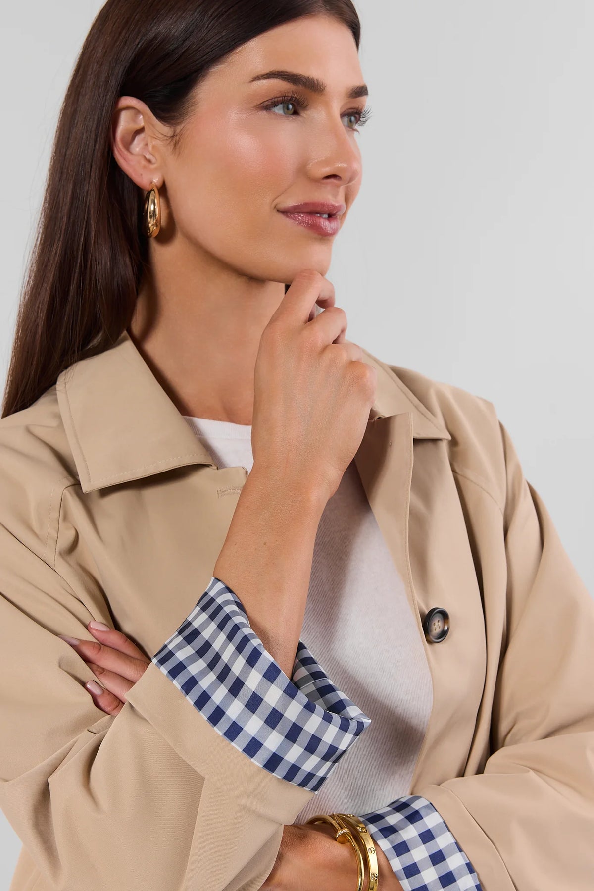 Tan Short Trench Jacket with navy gingham cuff detail - Close-Up On Model | Avara