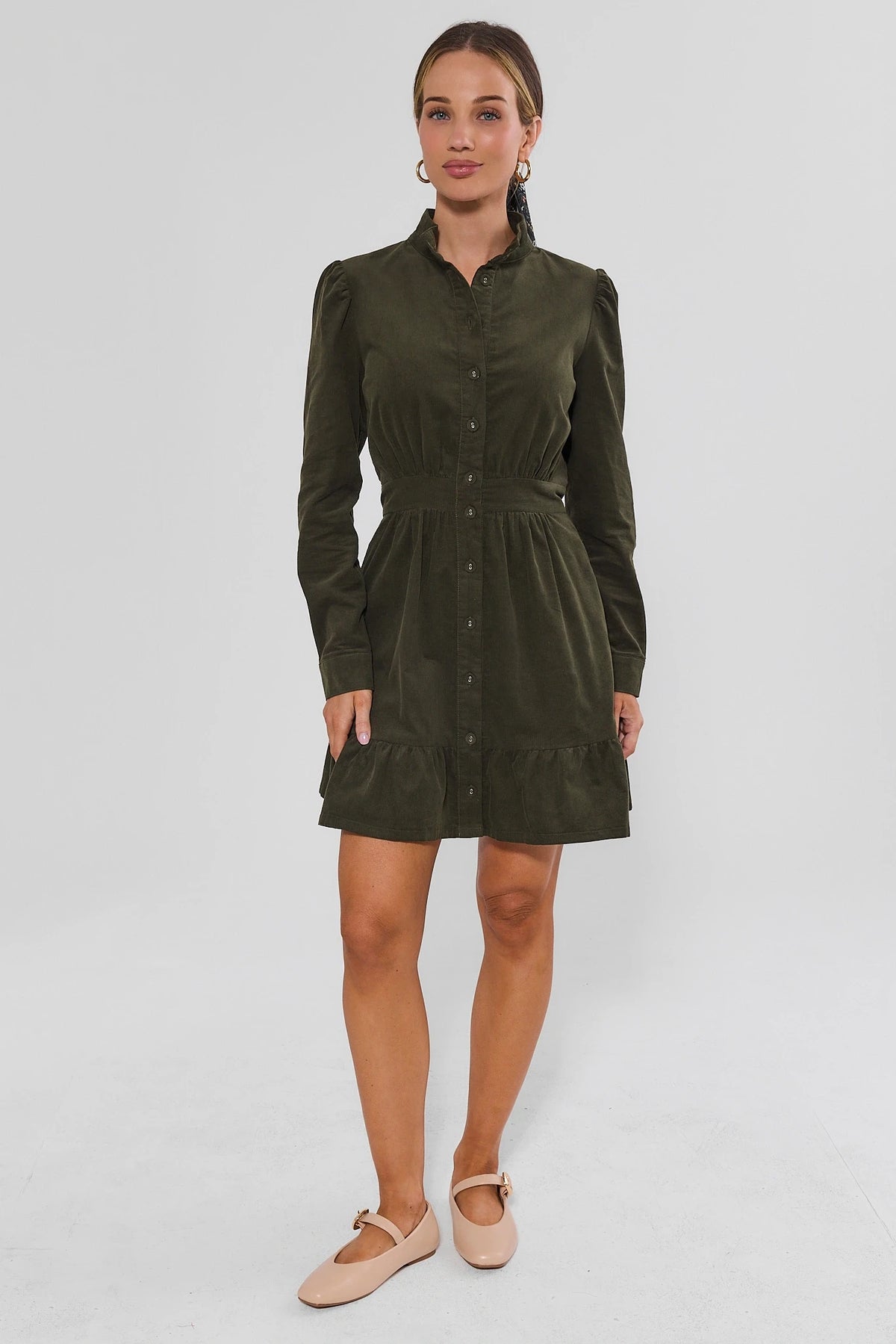 Olive Green Corduroy Fall Short Dress - Three-Quarter Side View Showing Tiered Hem On Model | Avara