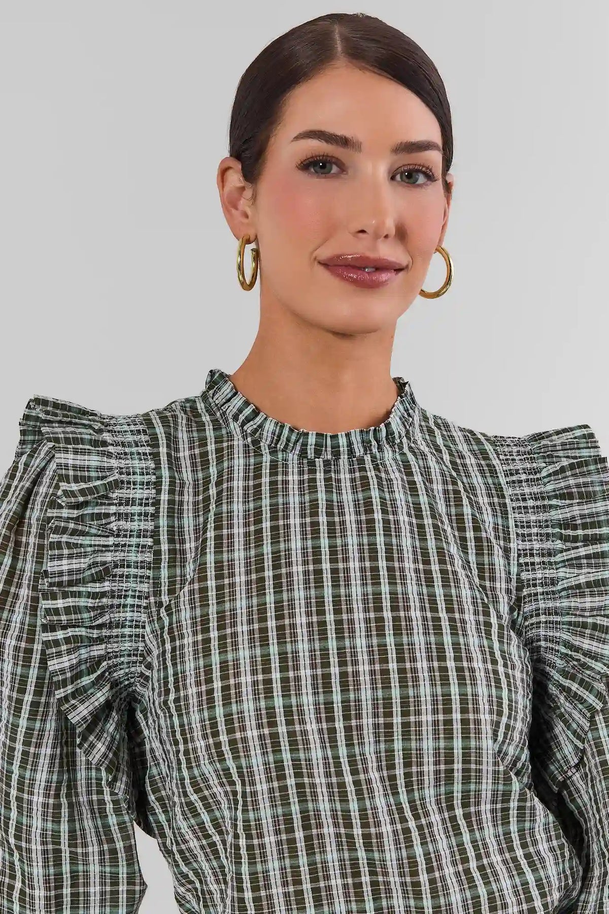 Green Plaid Ruffle Top - Close-Up Neckline and Ruffle Detail | Avara