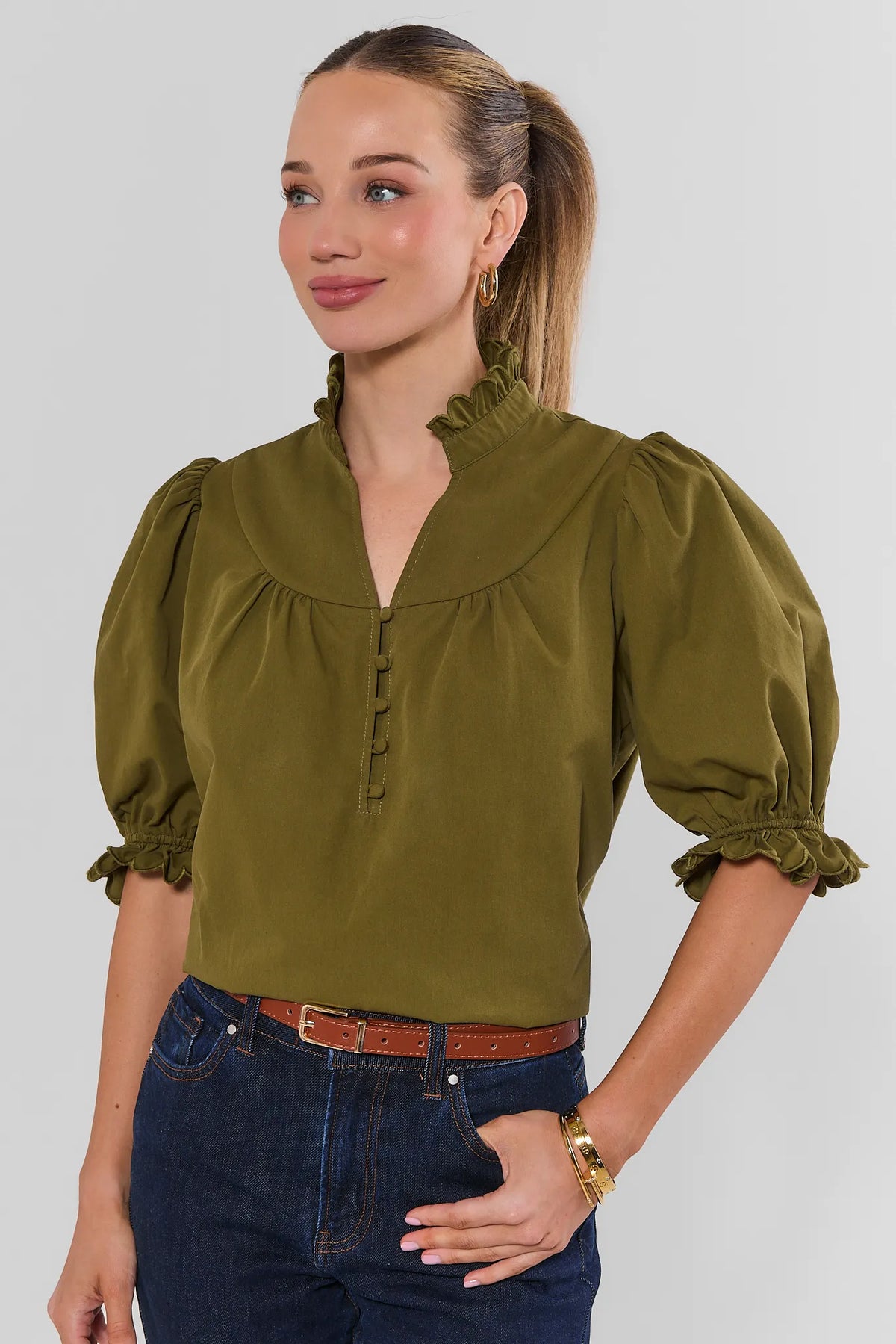 Olive Green Puff Sleeve Ruffle Neck Top - Front View On Model with Denim | Avara
