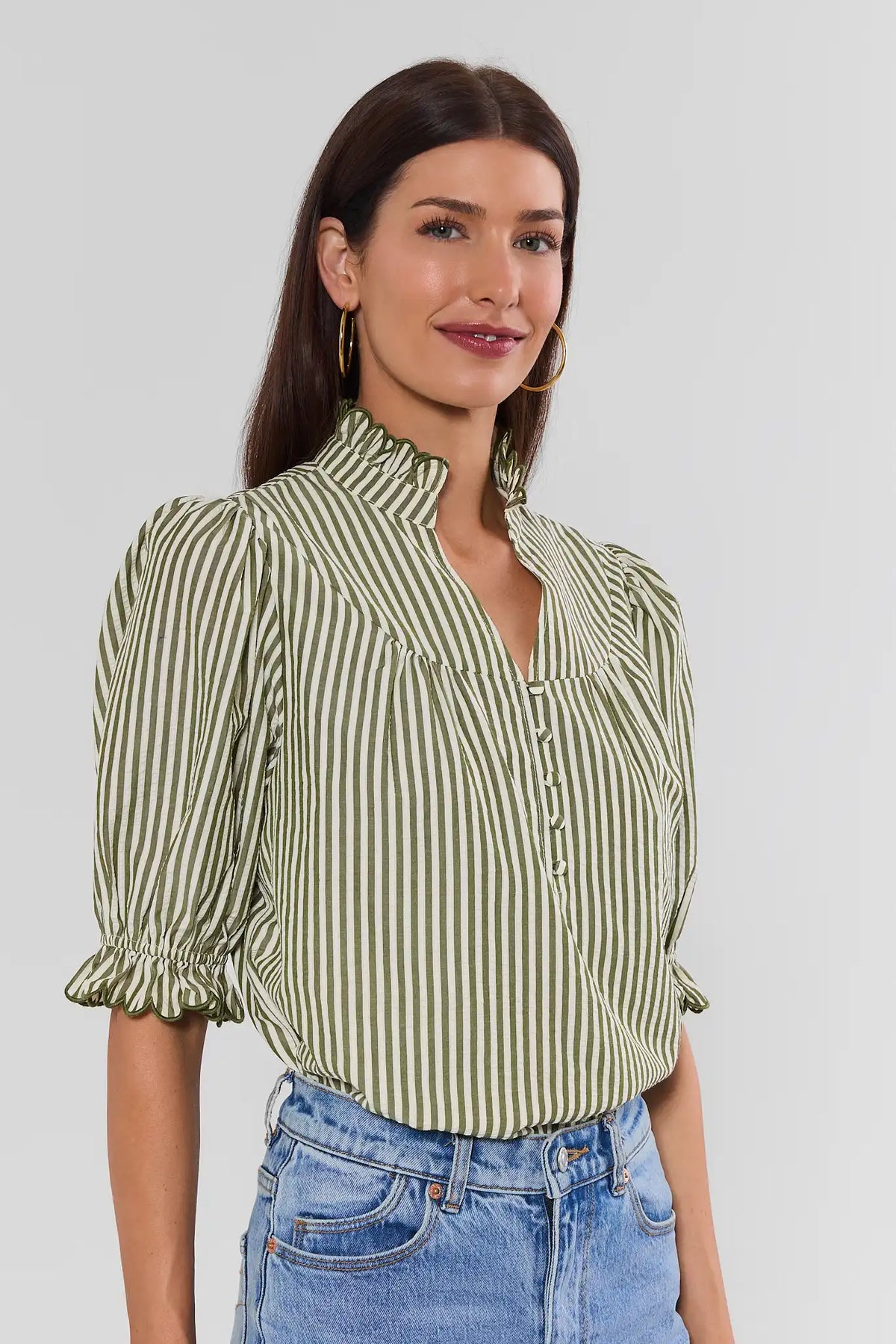 Green Striped Ruffle Trim Top - Three-Quarter Angle View On Model | Avara