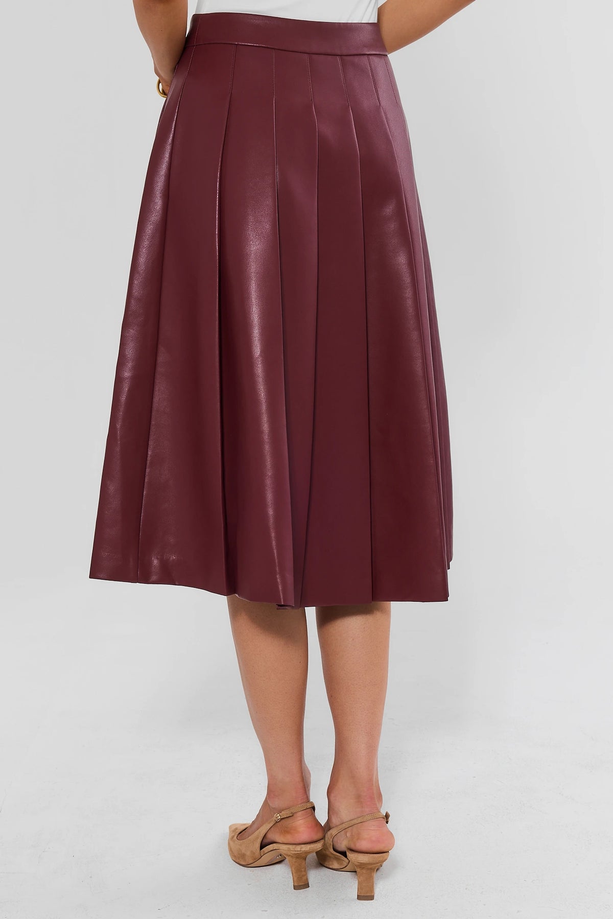 Maroon Pleated Midi Skirt - Back View Pleat & A-Line Silhouette Detail On Model | Avara