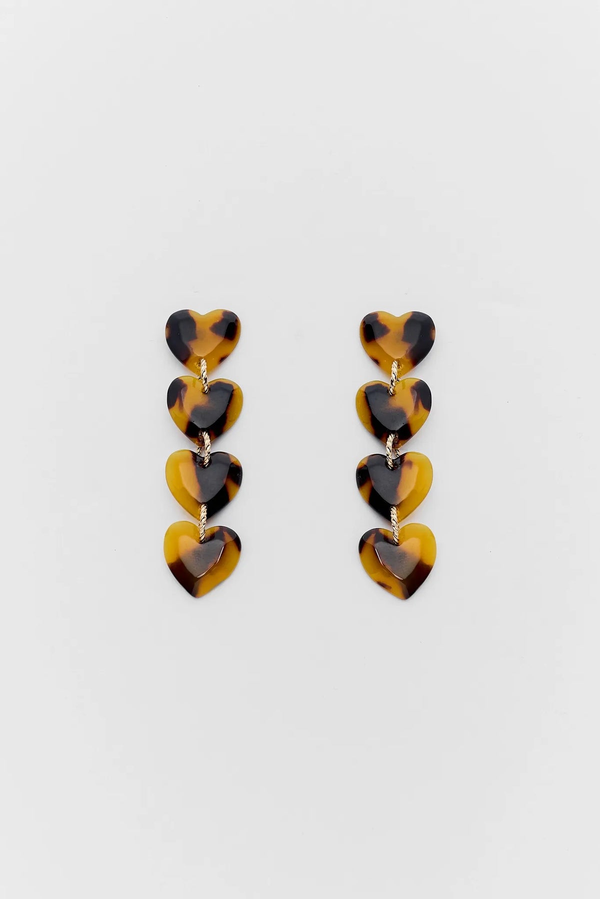 Brown Tortoise Acrylic Heart Drop Earrings - Flat Lay | Avara