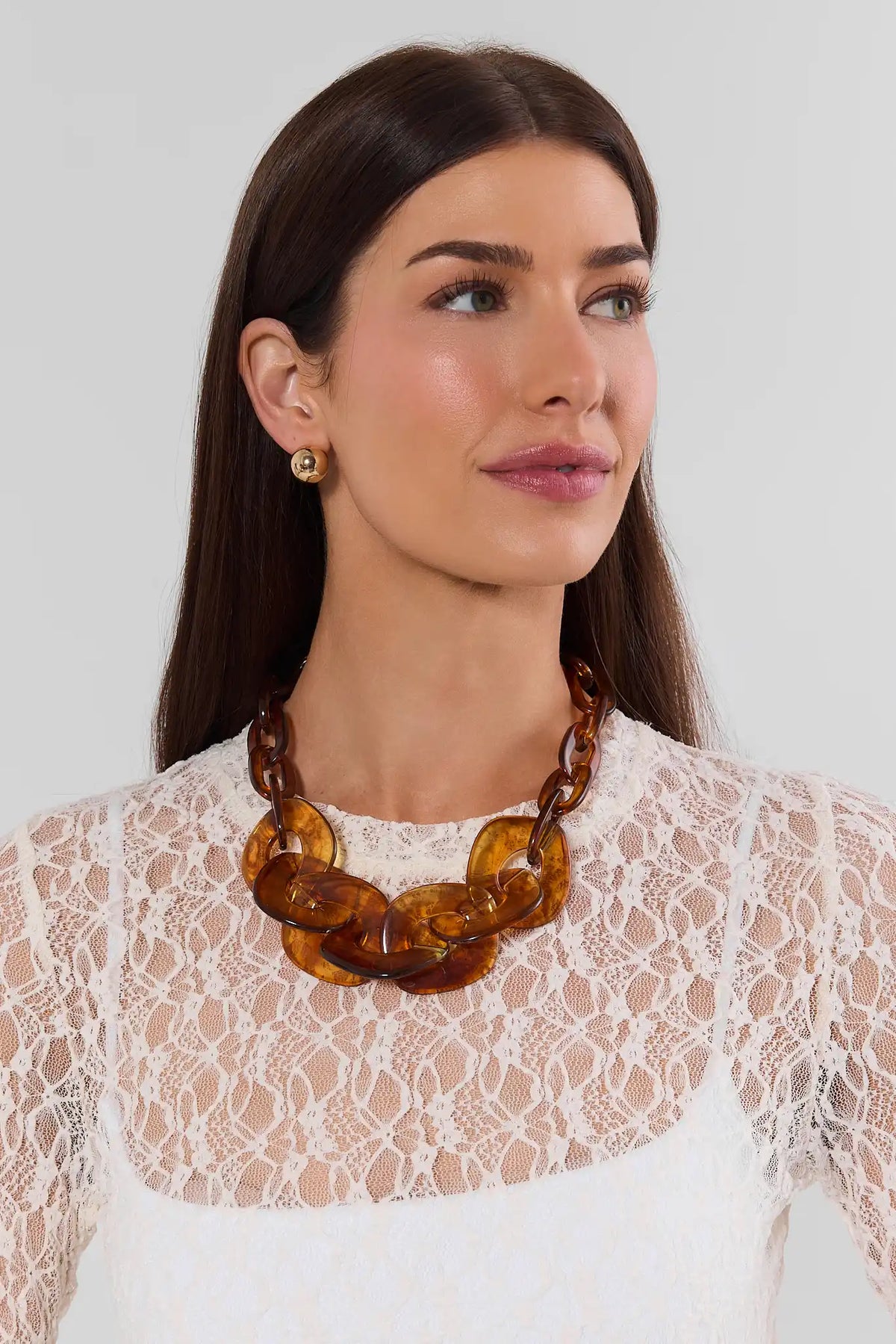 Brown Chunky Acrylic Chain Necklace On Model with White Lace Top - Front View | Avara