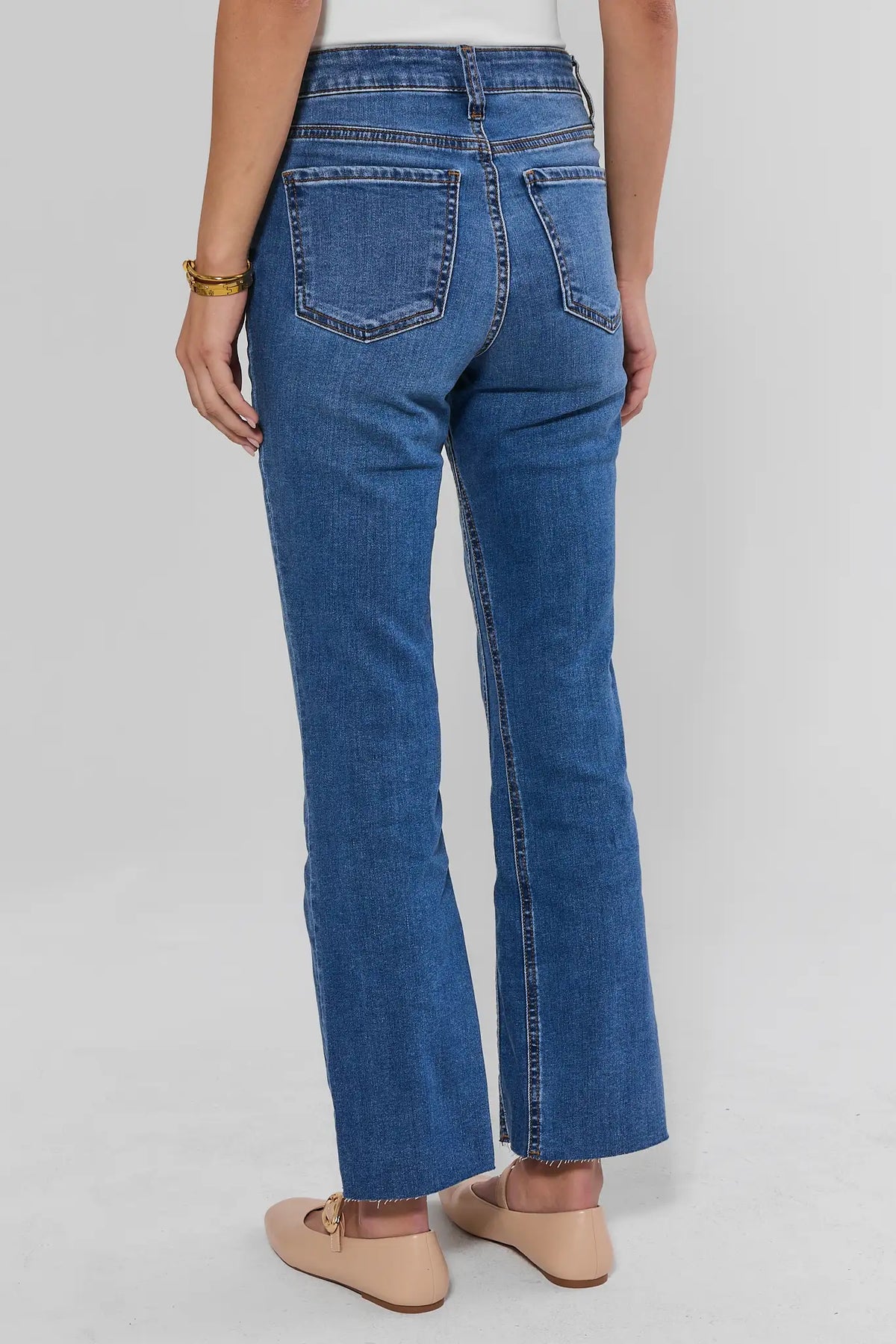 Medium Wash Denim Kick Flare Jeans - Back View with Classic 5-Pocket Detail | Avara