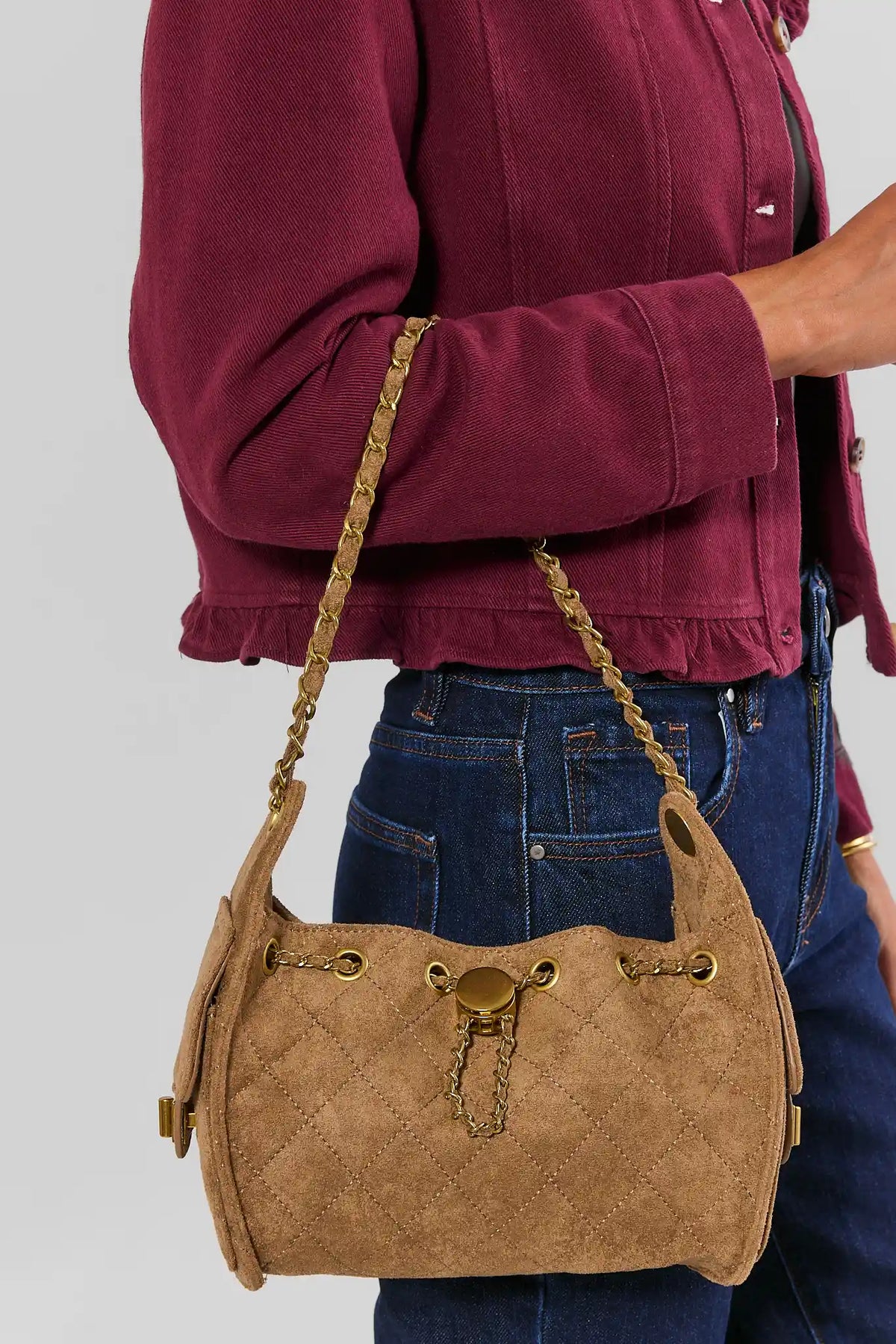 Tan Faux Suede Quilted Bucket Bag Styled On Model with Denim - On Model View | Avara